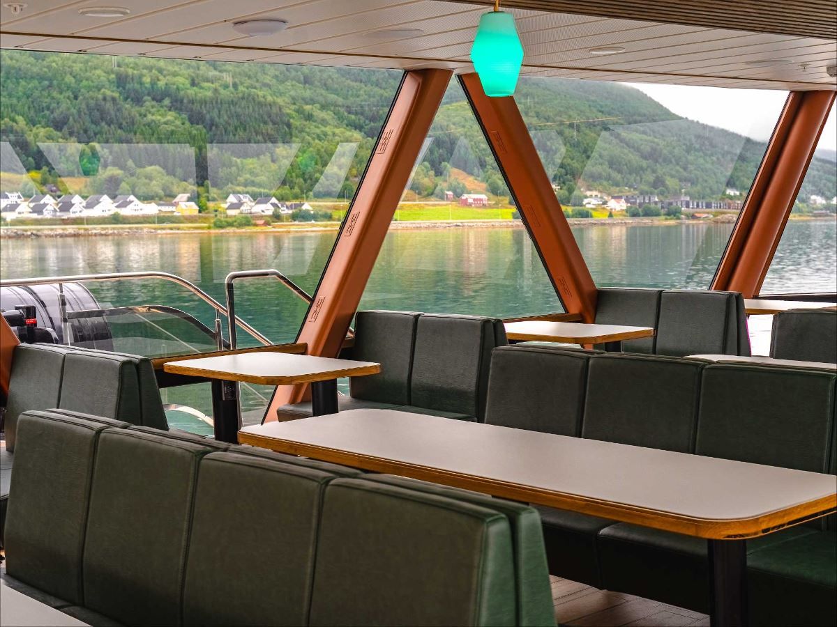 Inside the boat, with fine seats and tables