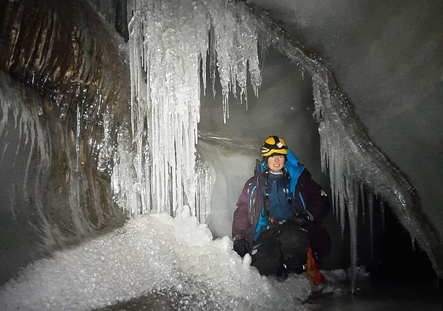 A guide inside an ice cave