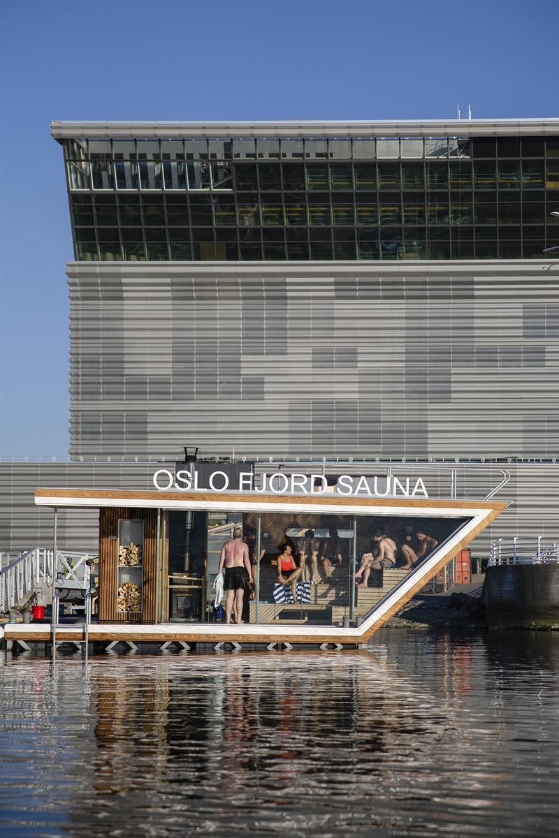 one of the sauna rafts on the water with the Munch Museum in the background
