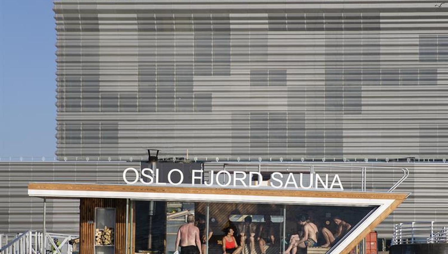 one of the sauna rafts on the water with the Munch Museum in the background