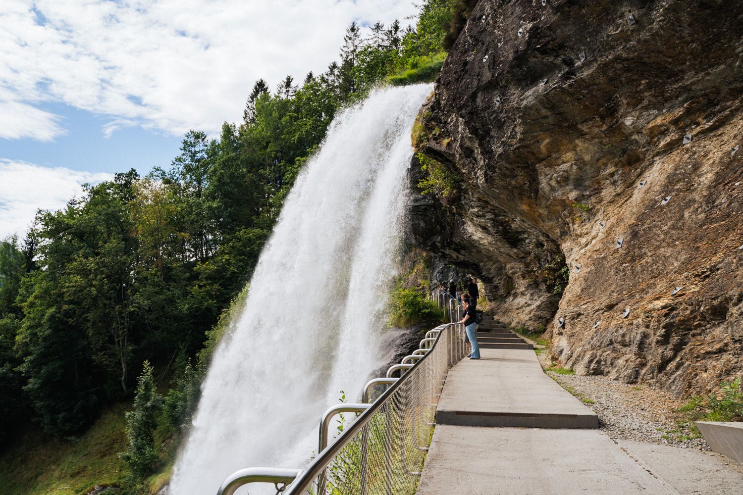 Experience Steinsdalsfossen from a unique angle – the path behind the waterfall.