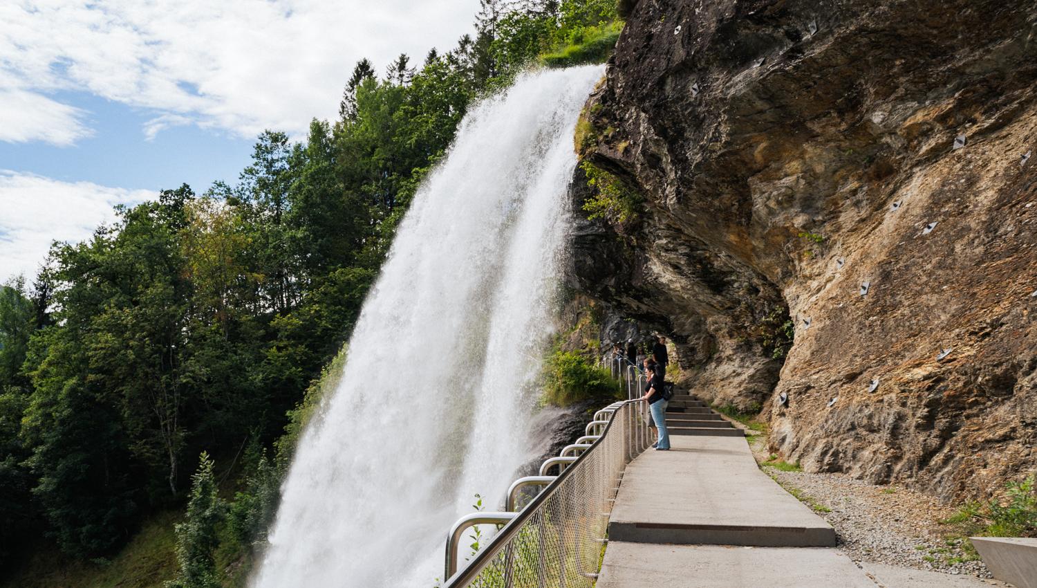 Experience Steinsdalsfossen from a unique angle – the path behind the waterfall.