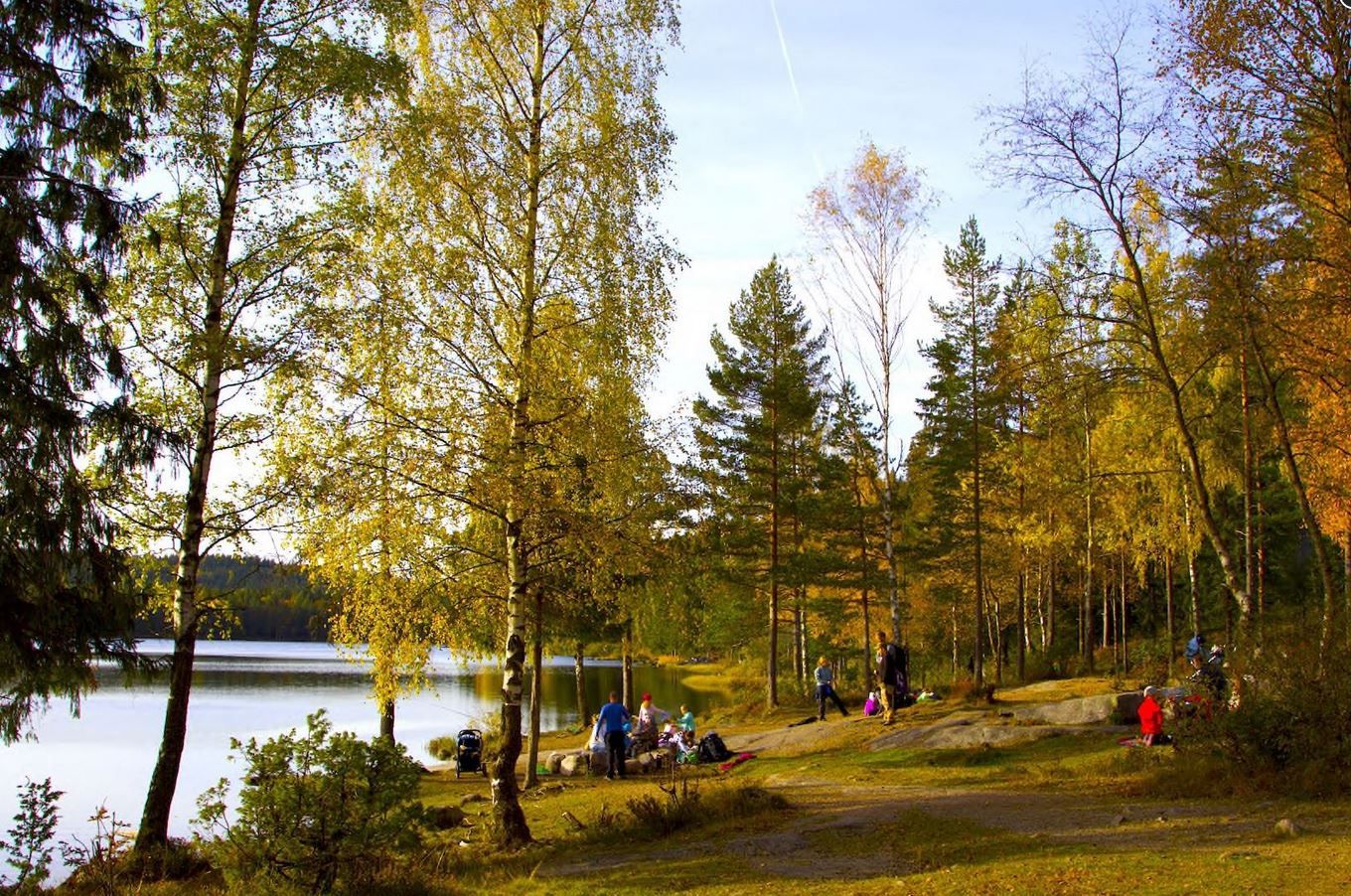 hikers sitting by the water