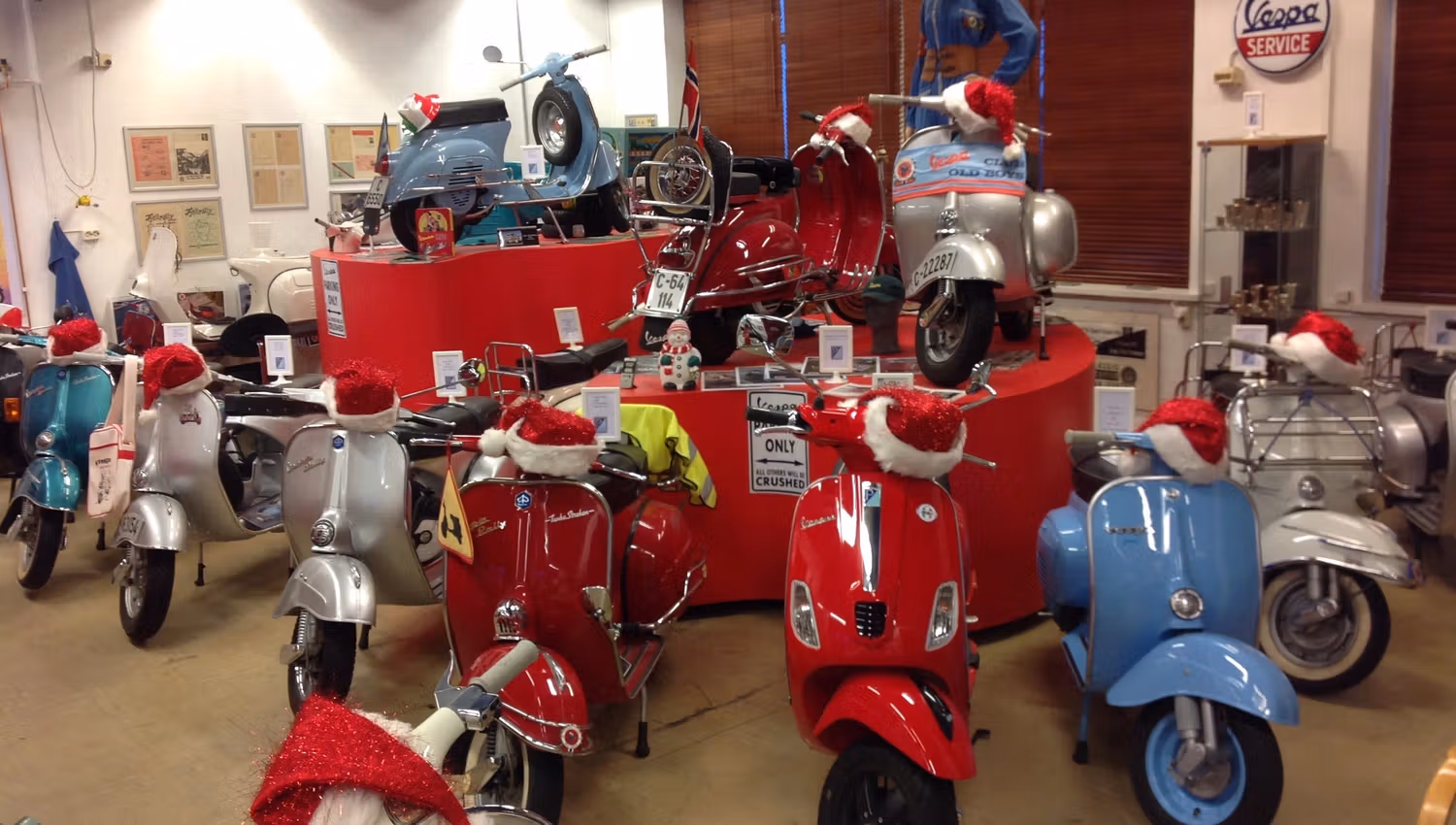 Red and colorful Vespa motor bikes
