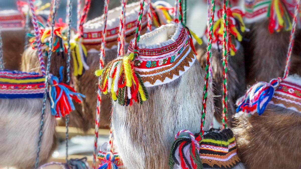Colourful traditional bags and details from Sámi handicrafts.