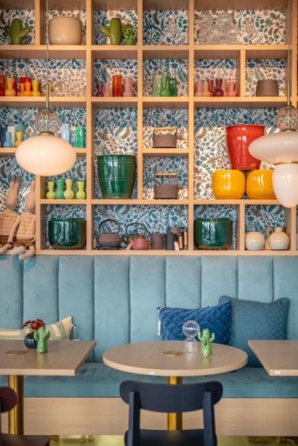 Shelf with vases, and cafe table