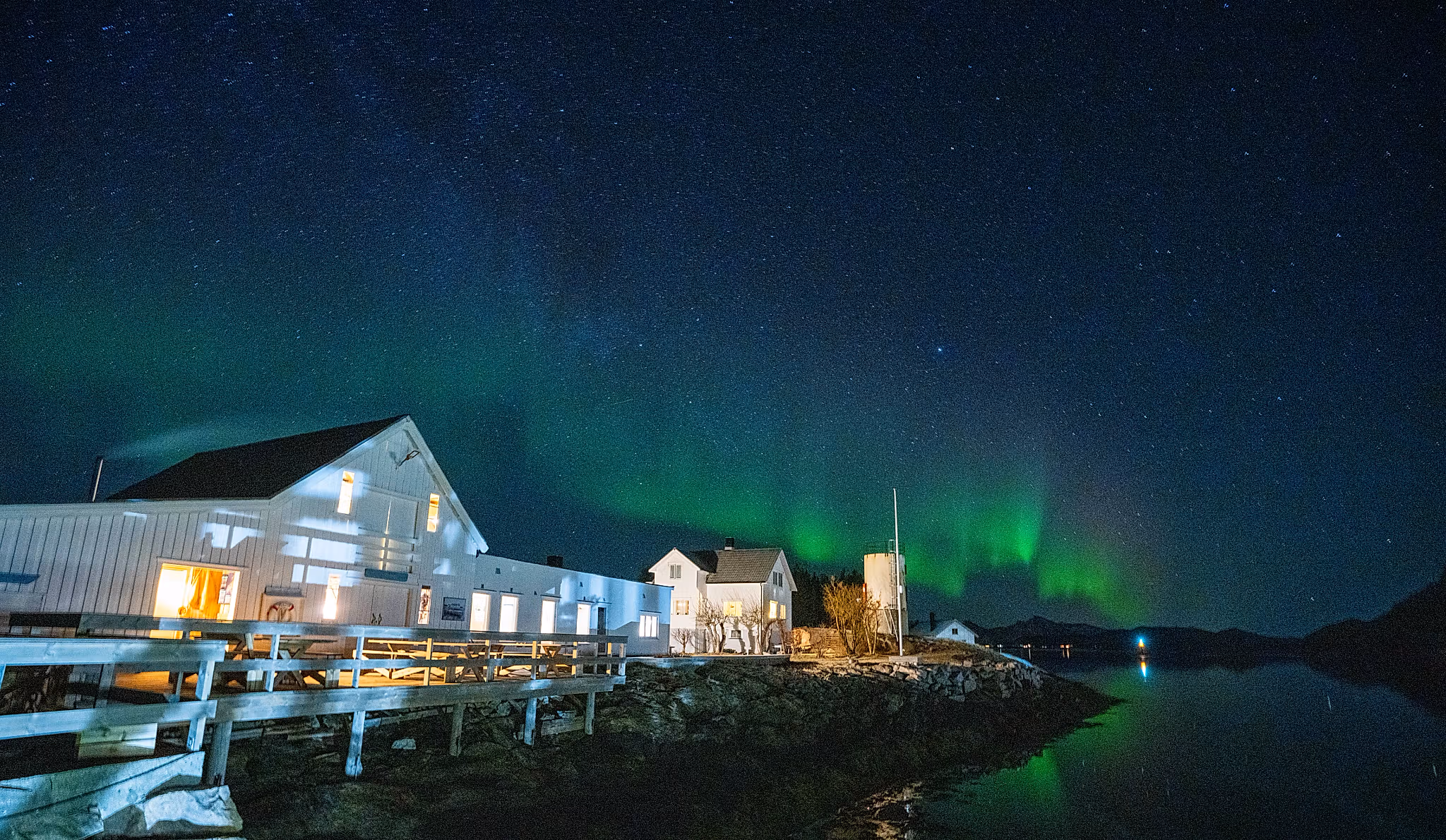 Northern lights over Naustholmen houses.