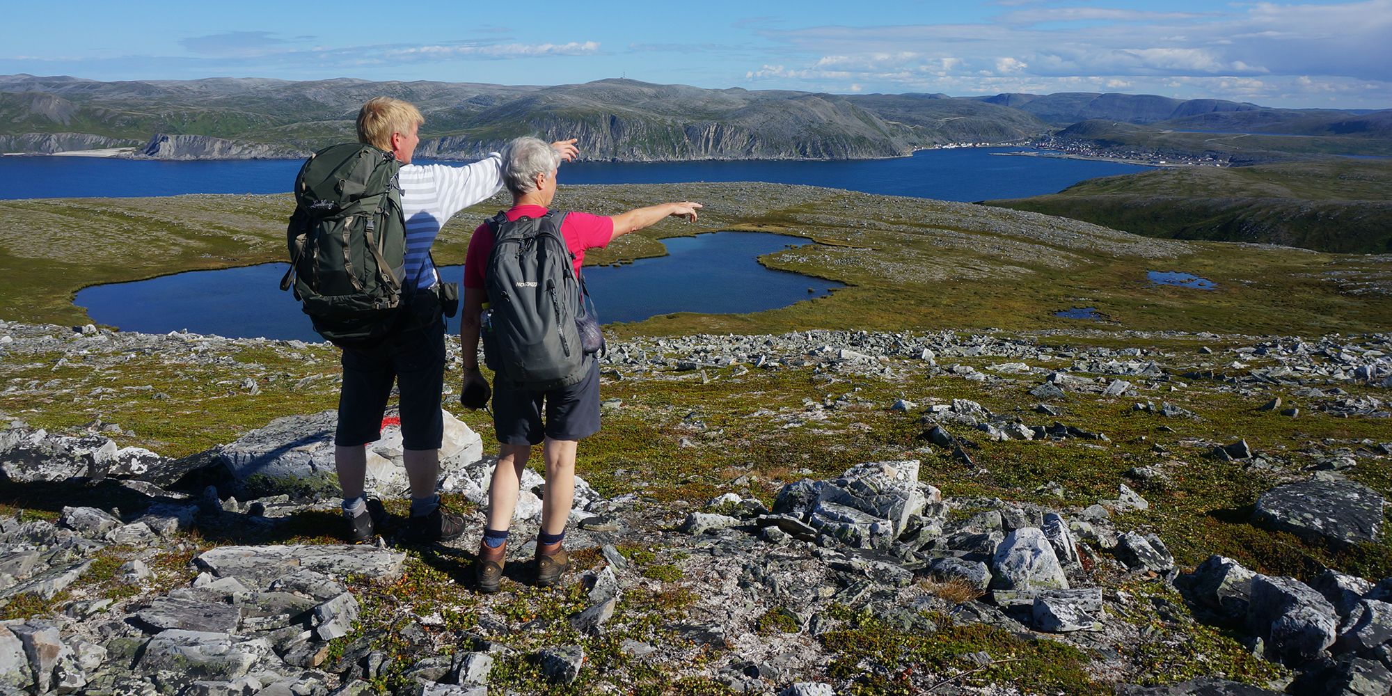 Two people hiking in Nordkyn