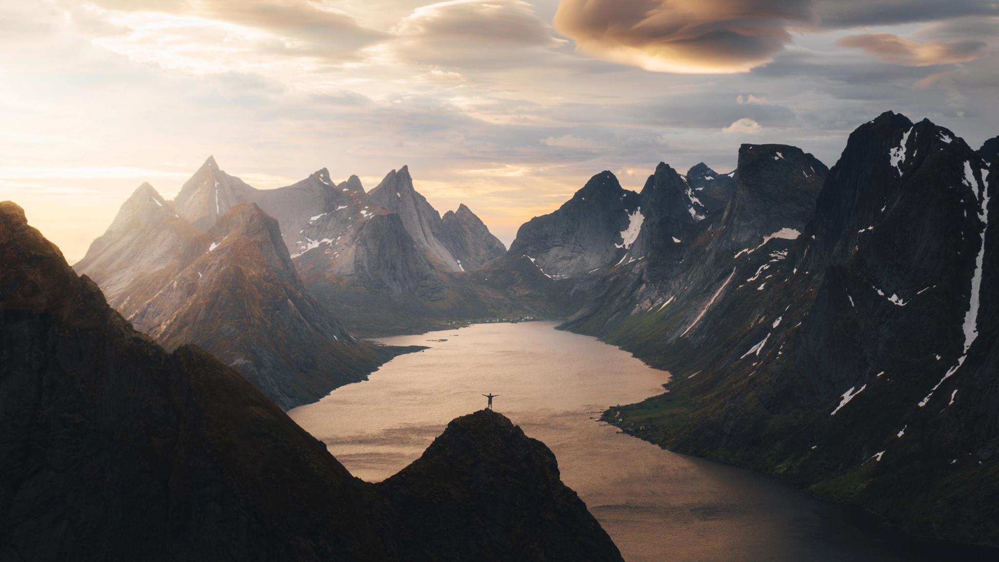 Mountain hike under the midnight sun in Lofoten
