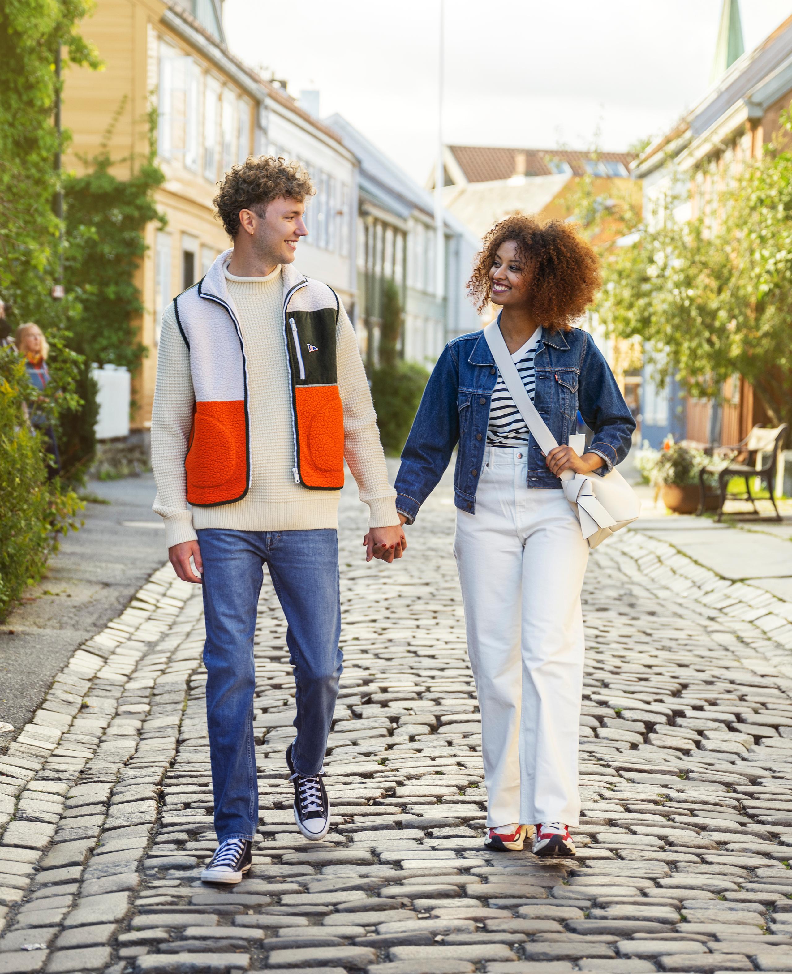 Couple strolling in Bakklandet