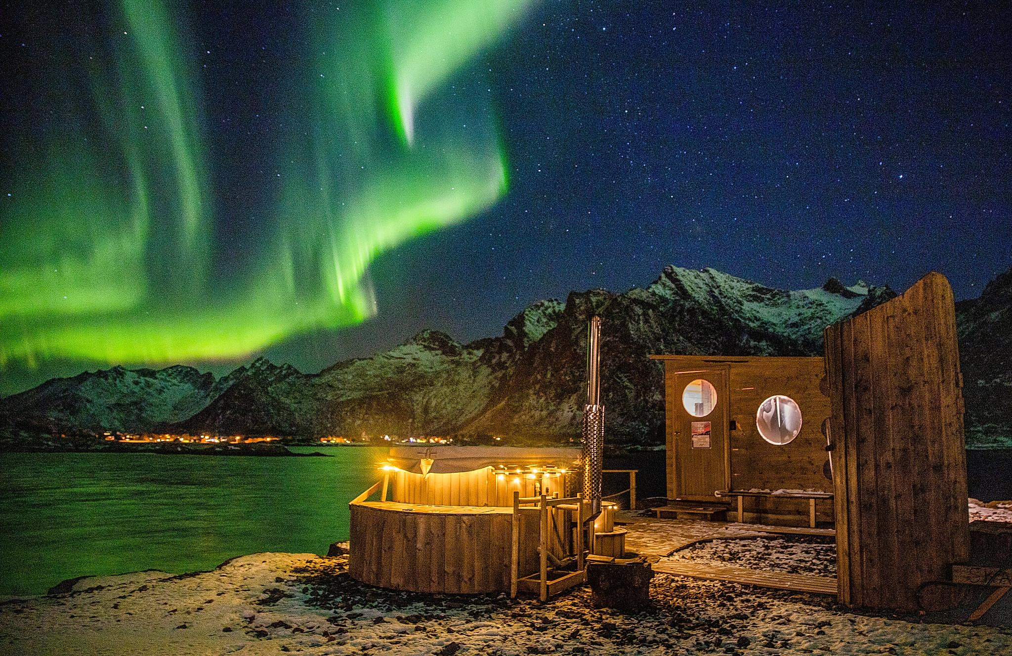 Skårungen sauna under the northern lights in Lofoten, Northern Norway
