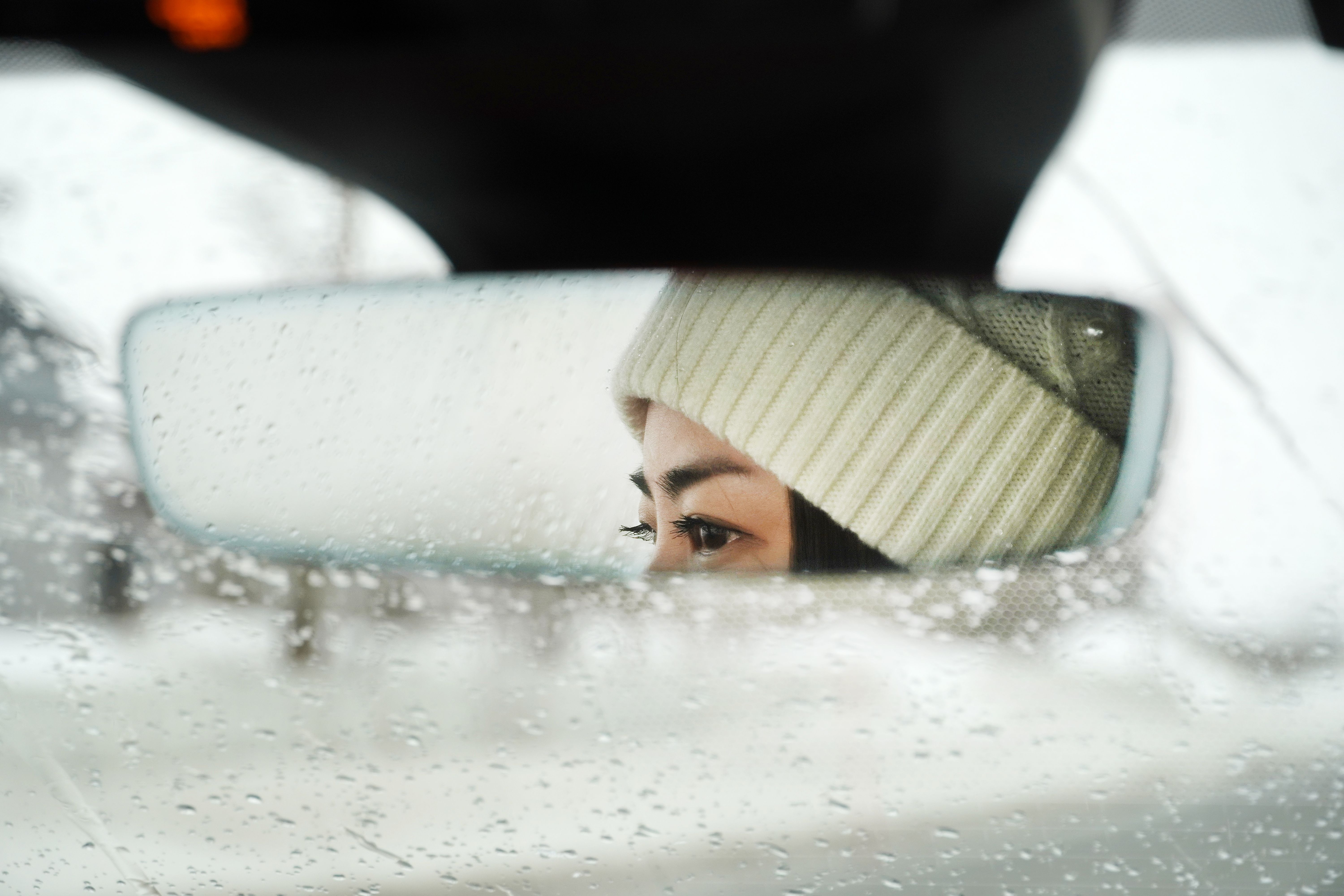 A woman driving a car