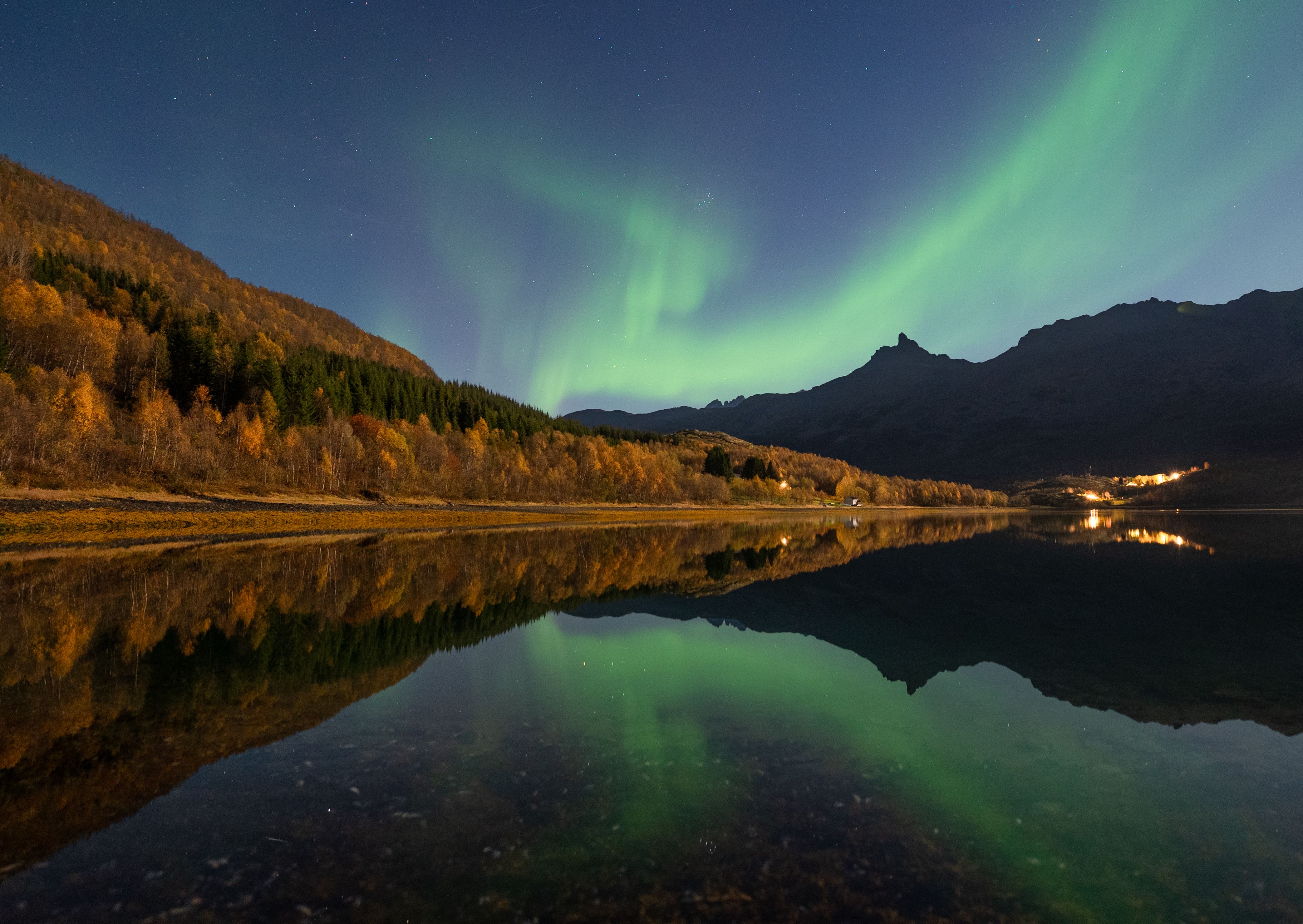 Autumn landscape with northern lights in Lyngen