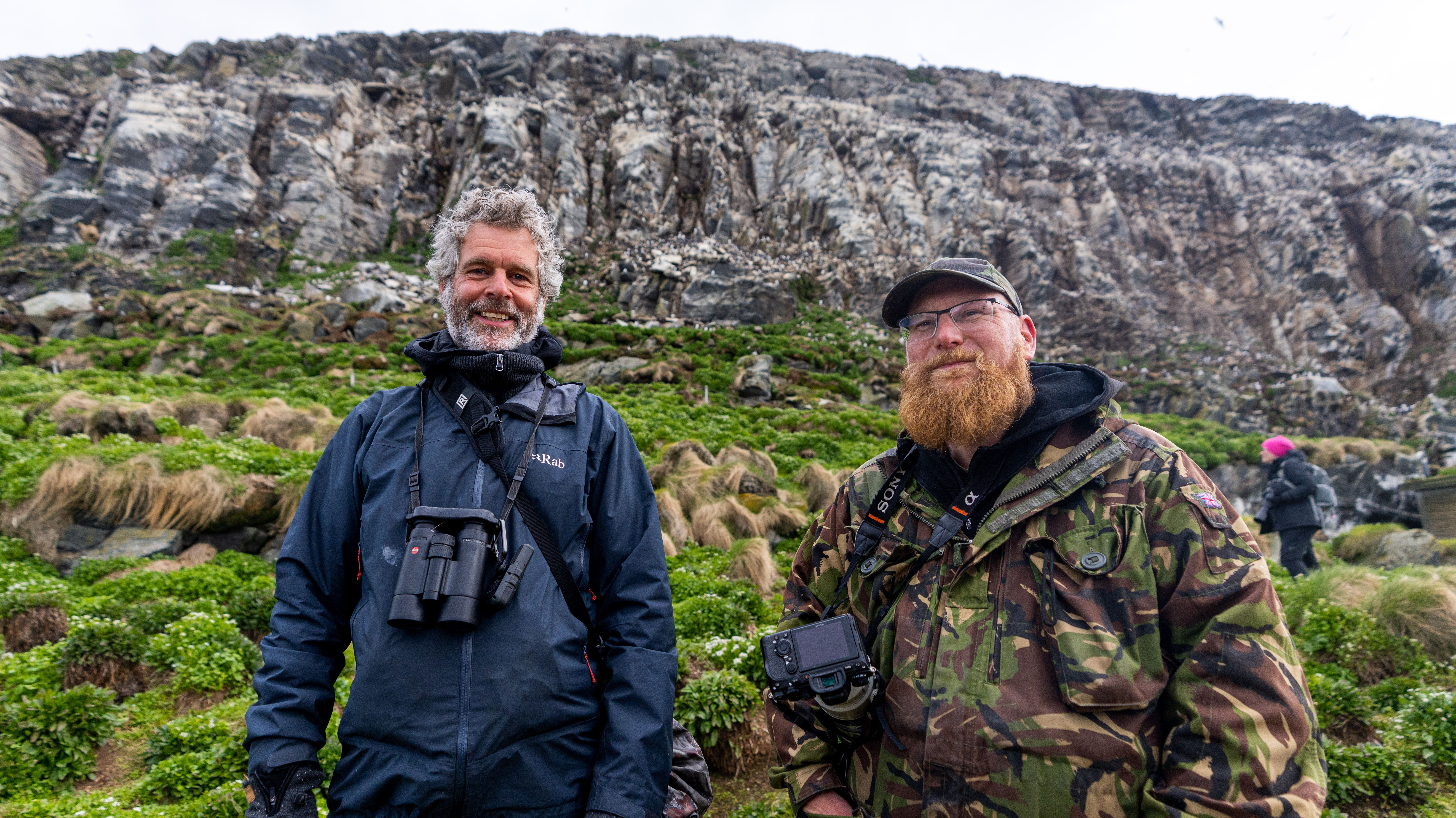 Two birdwatcher tourists at Hornøya in Varanager, Northern Norway