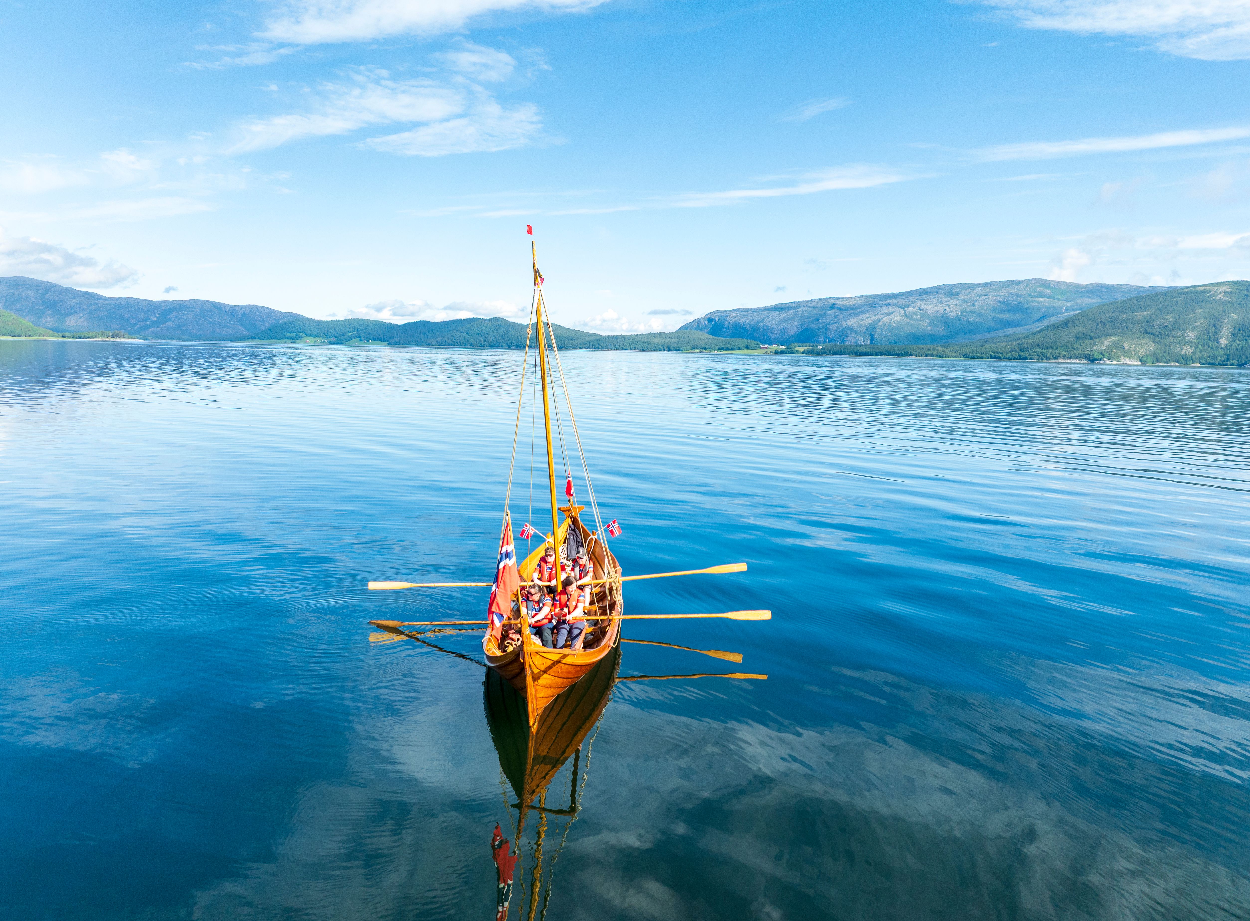 A replica of a viking boat in a fjord