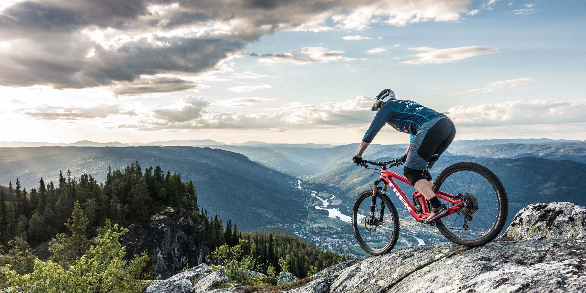 Mountain biking in Hallingdal: A person mountain biking on Mount Beia near Nesbyen in Eastern Norway