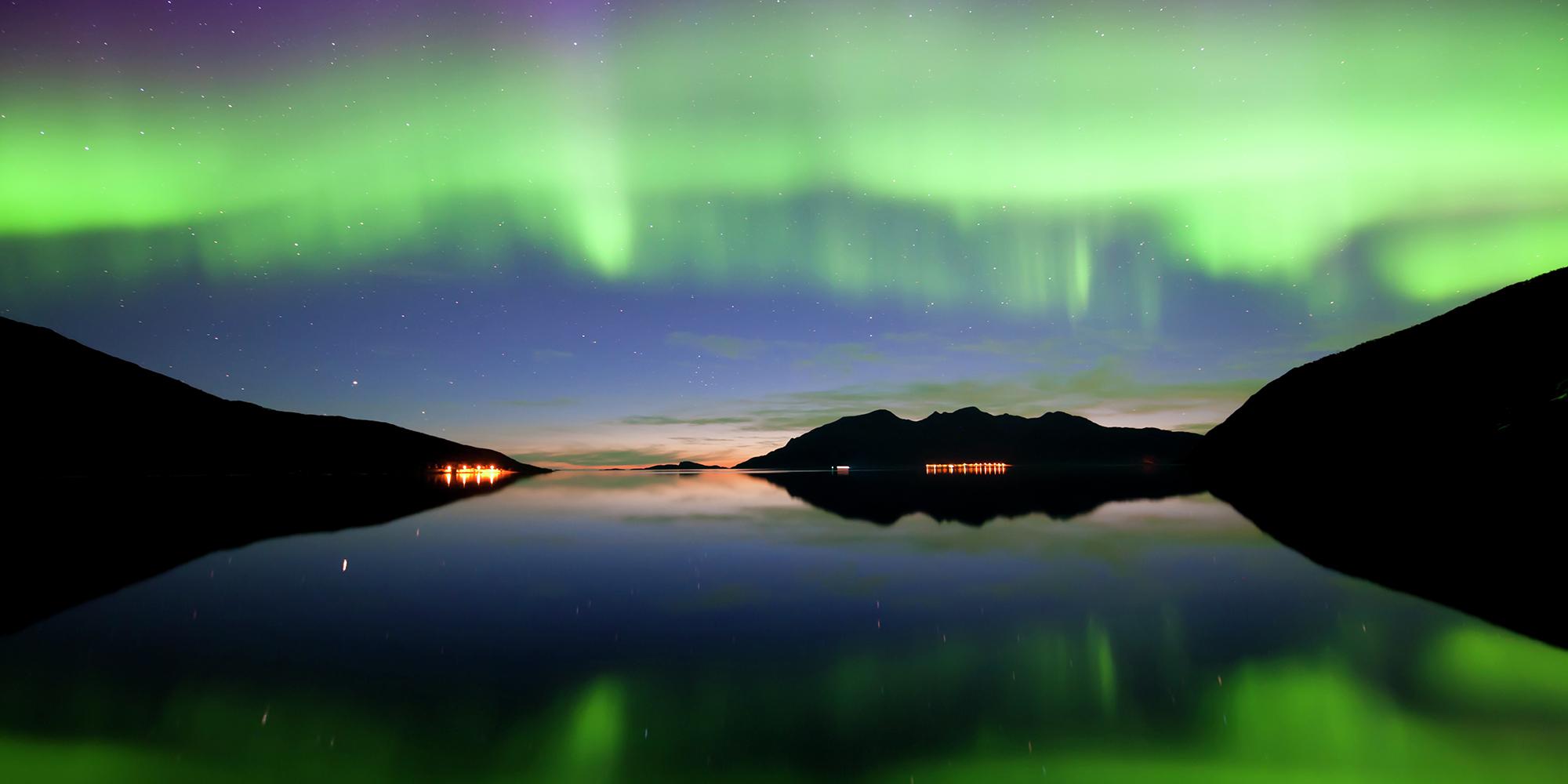 Northern lights over Grøtfjord in Kvaløya, Northern Norway