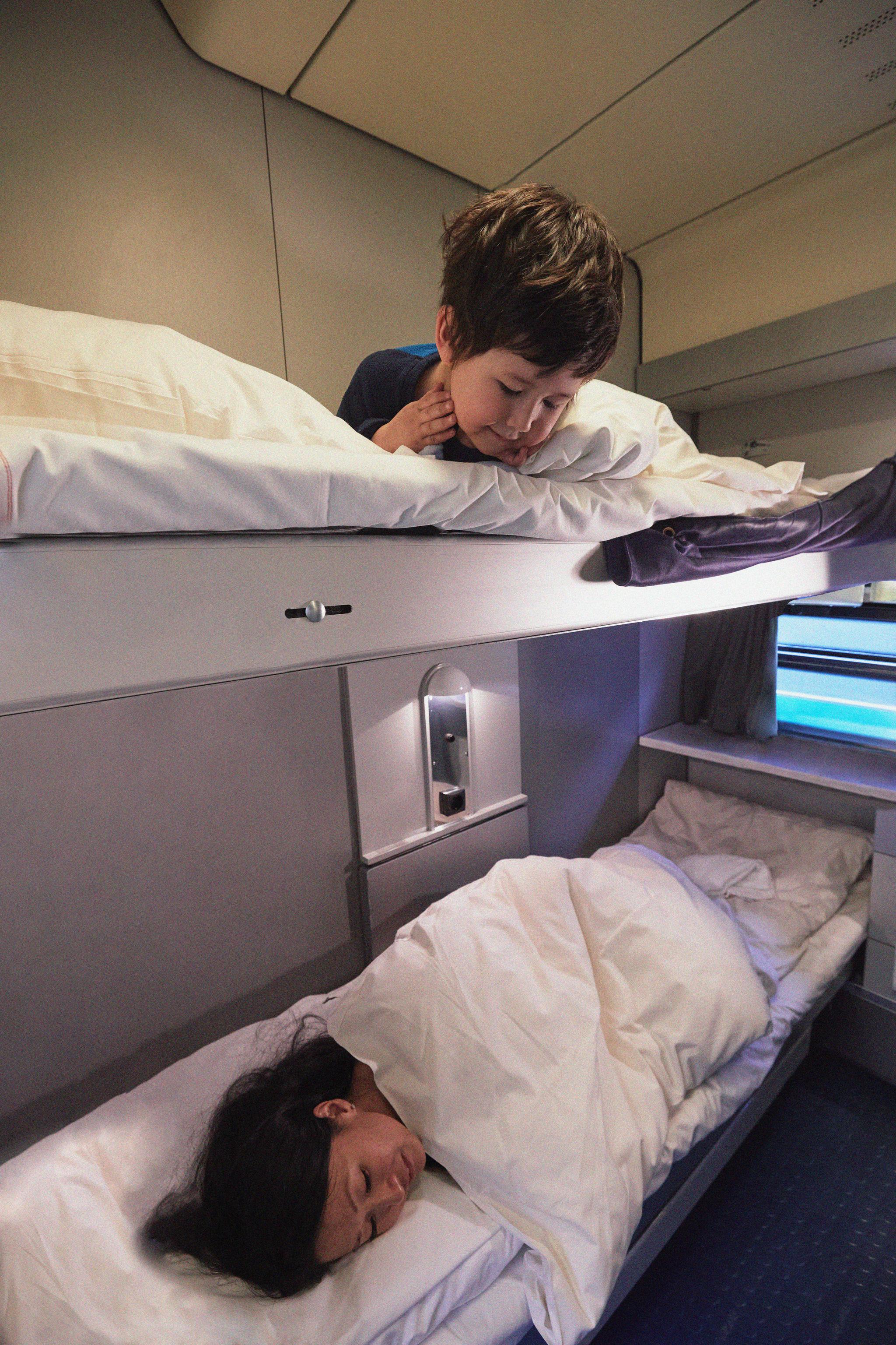Kid sleeping in the train