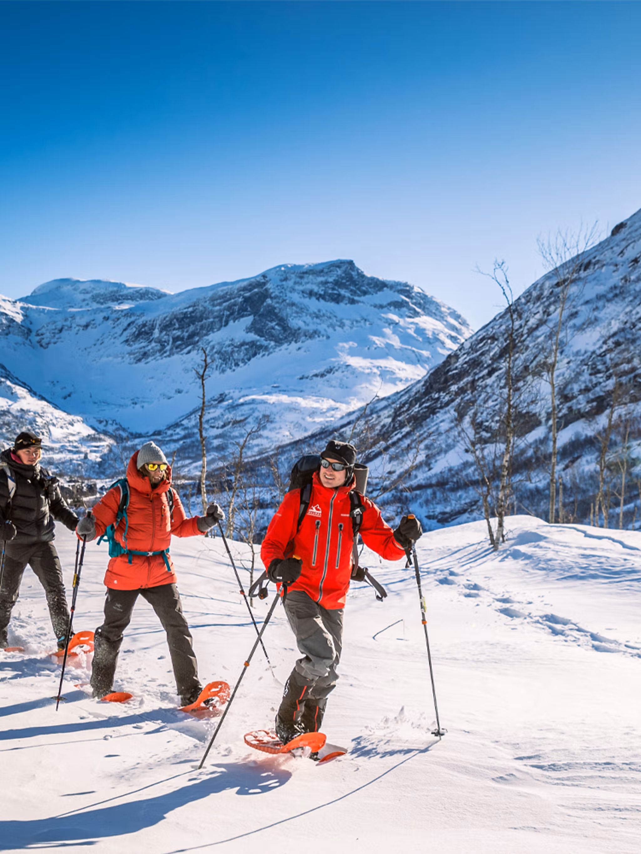 People snowshoeing in Møre og Romsdal, Fjord Norway