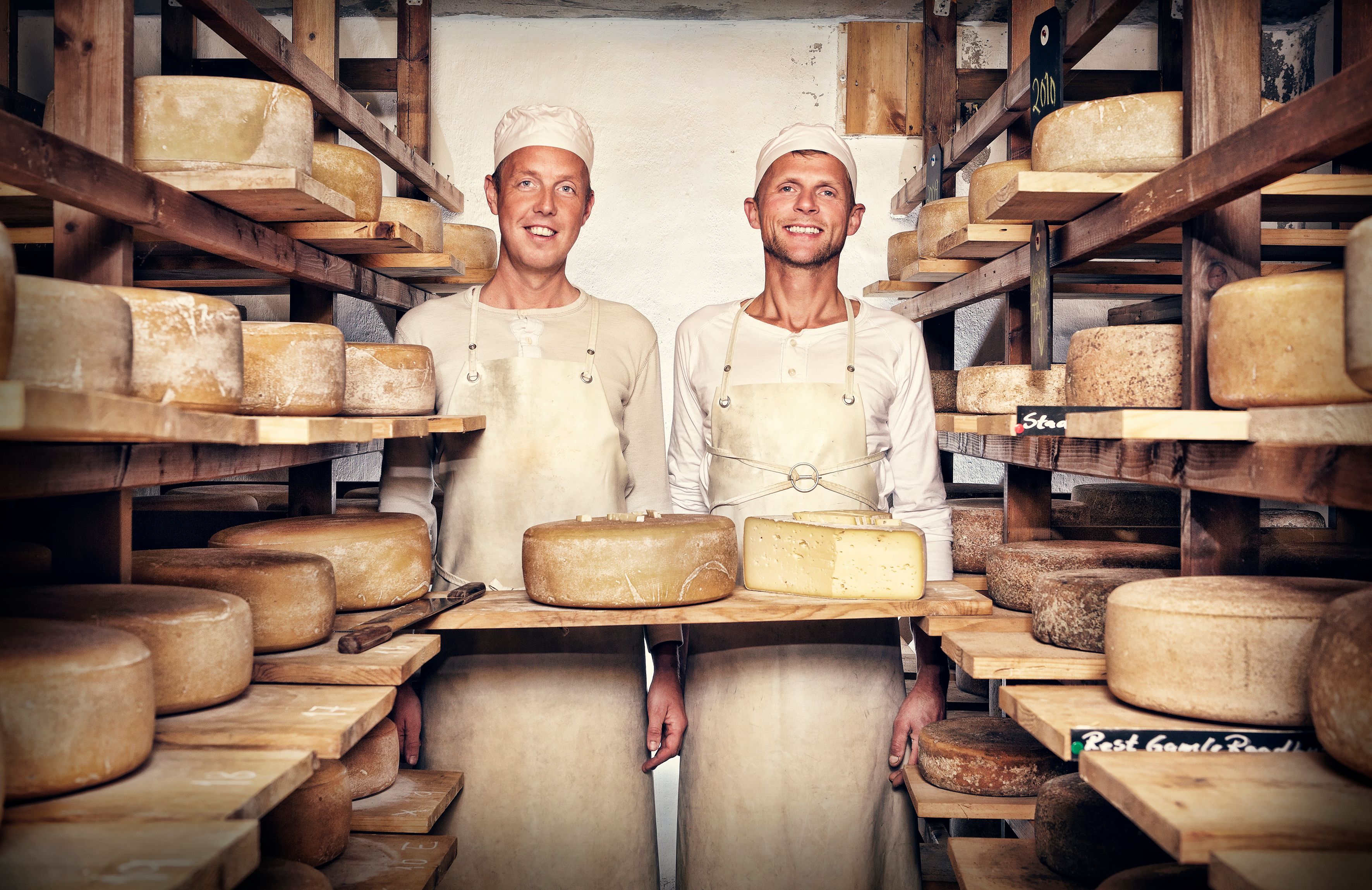 Two men in the cheese factory at Brimi Sæter in Jotunheimen, Eastern Norway