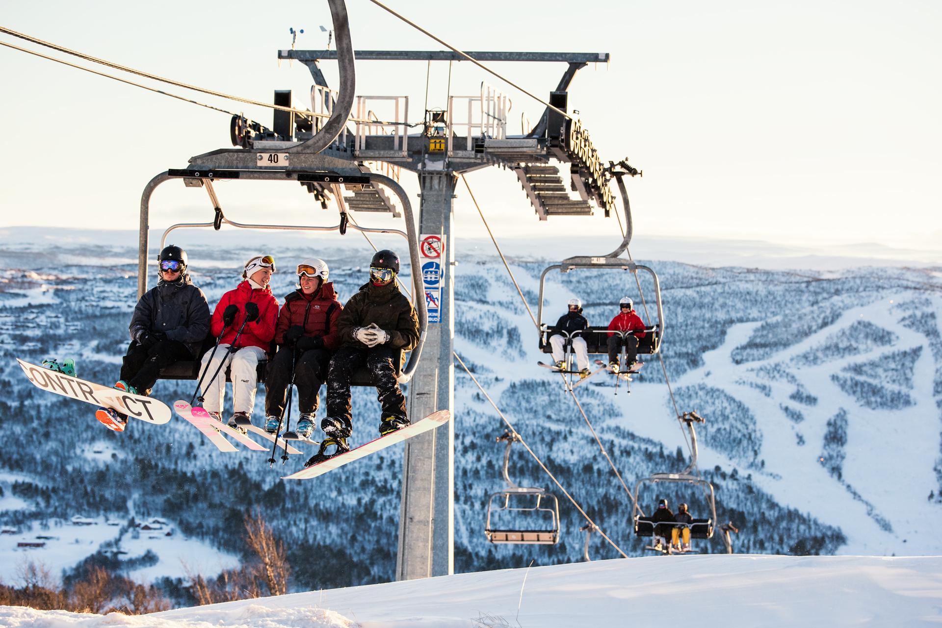 Skiers in the chairlift in Geilo