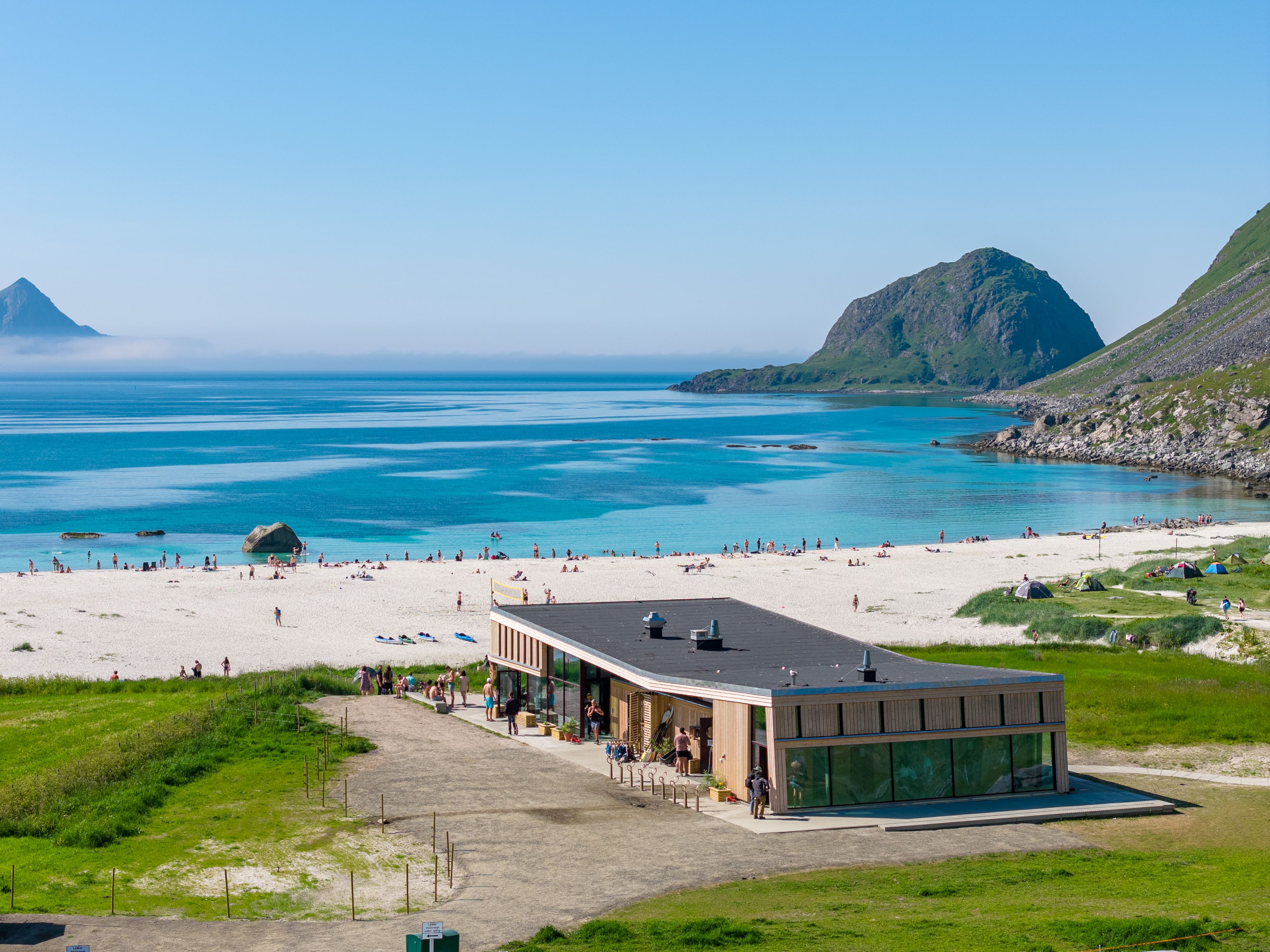 People enjoying the sun on Hauklandstranda beach