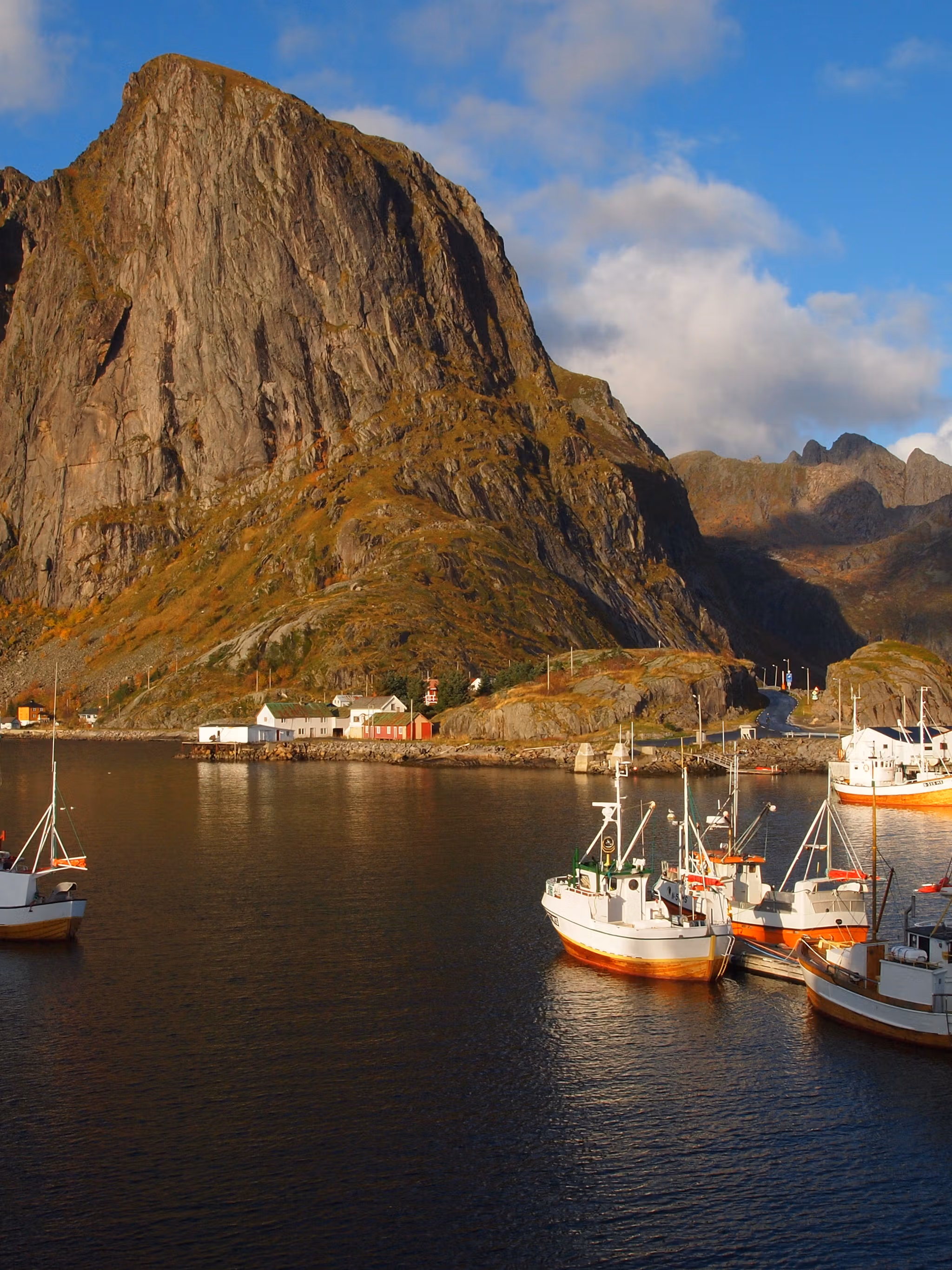 Fisherman´s cabins on a small island below big montains.