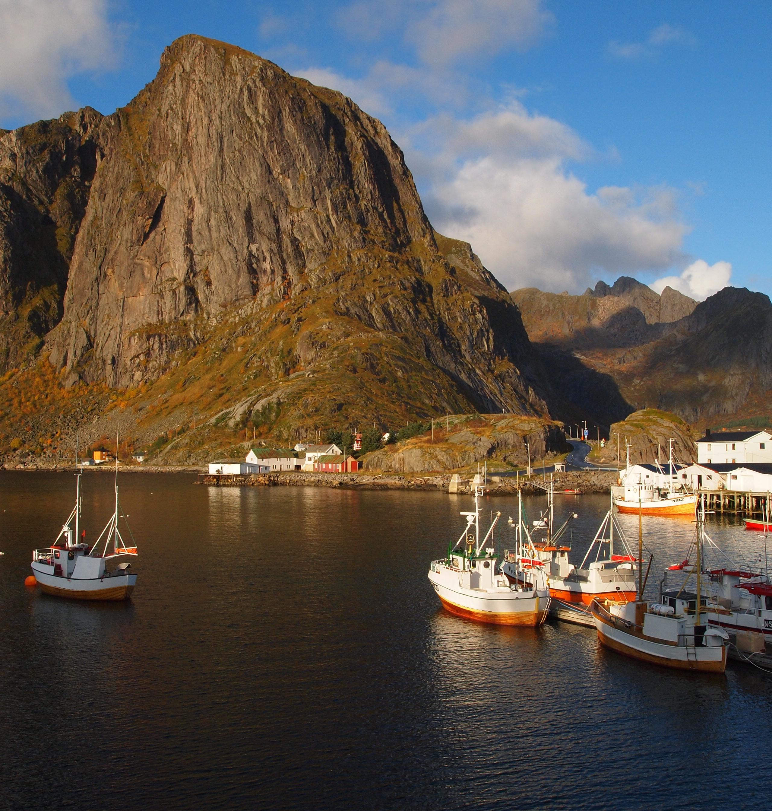 Fisherman´s cabins on a small island below big montains.