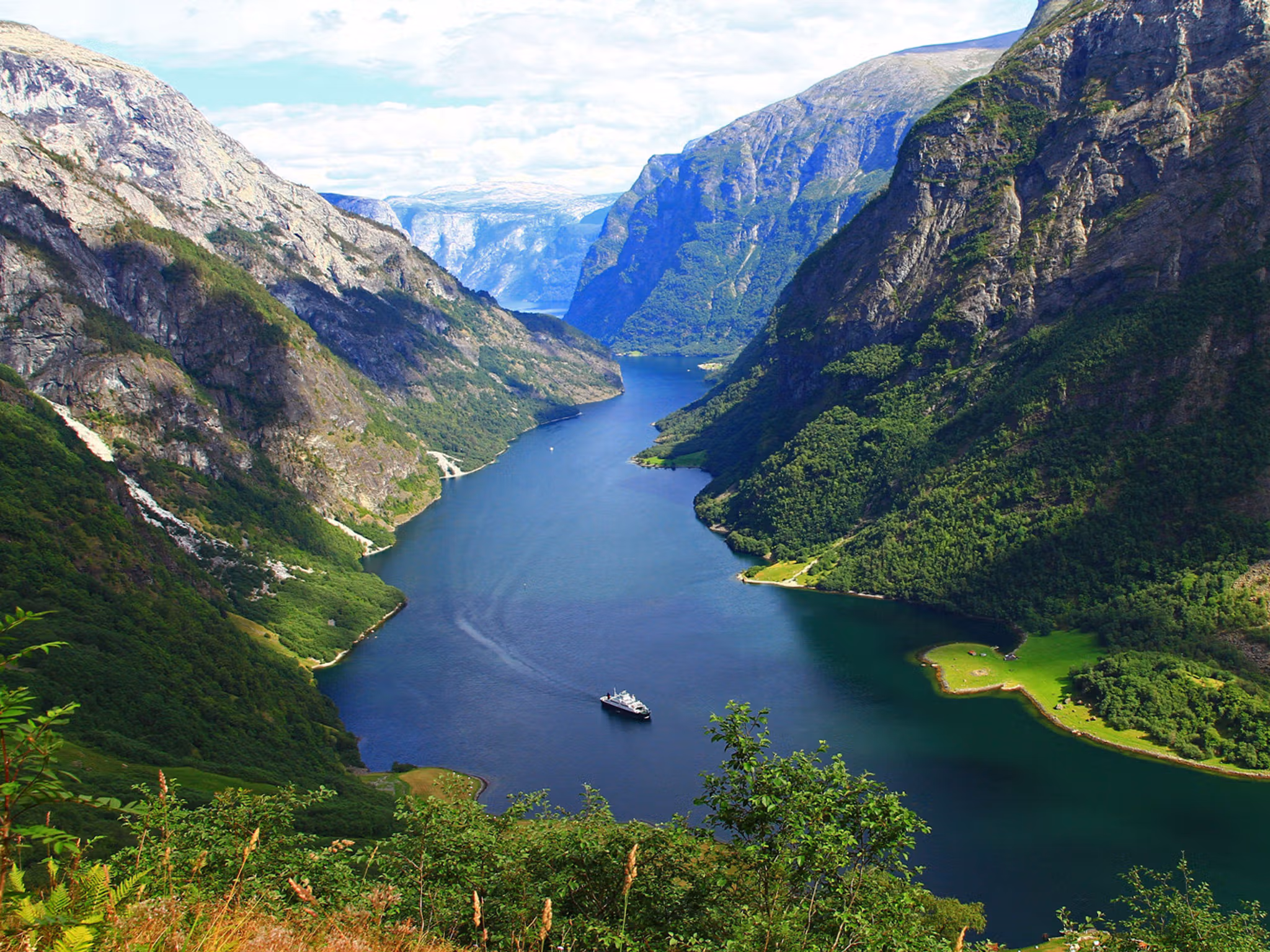 The Nærøyfjord in Fjord Norway on a sunny summer day