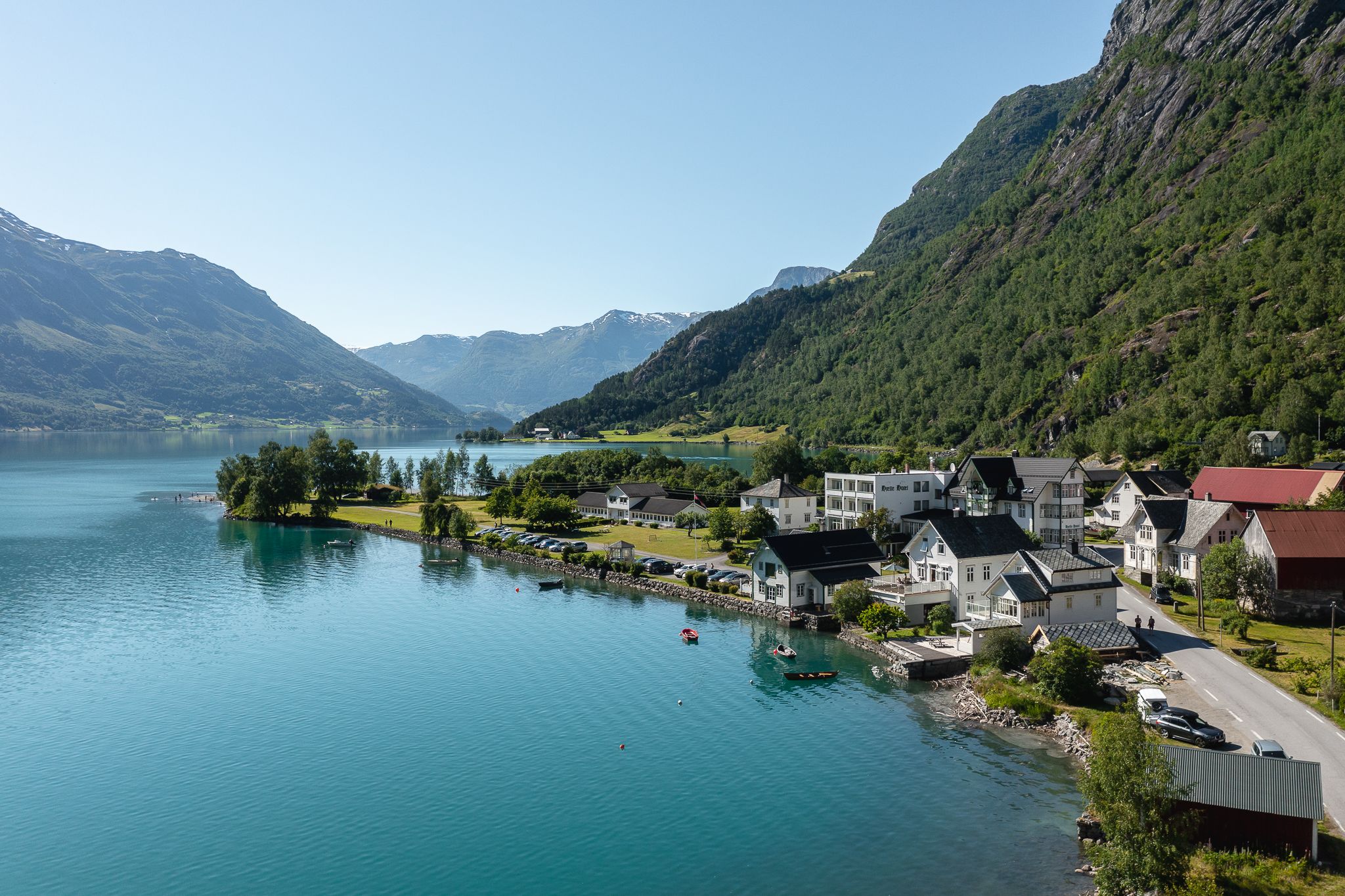 A village by a lake. 