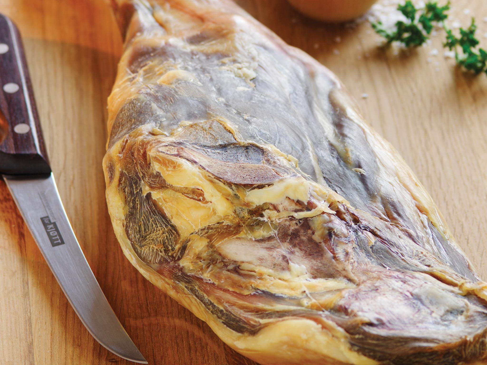 Fenalår on a cutting board