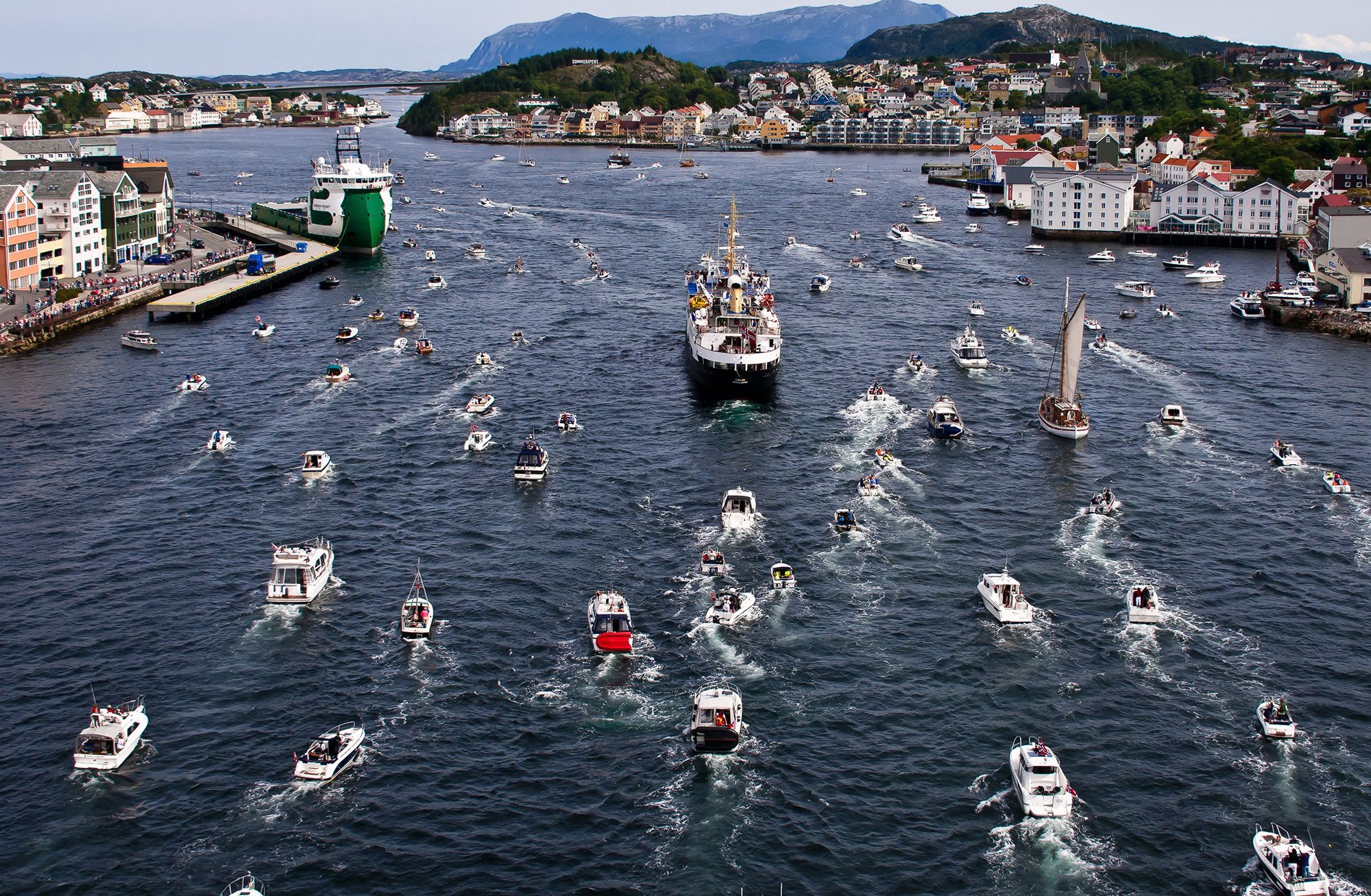 A myriad of large and small boats travelling towards Kristiansund in the Northwest, Fjord Norway