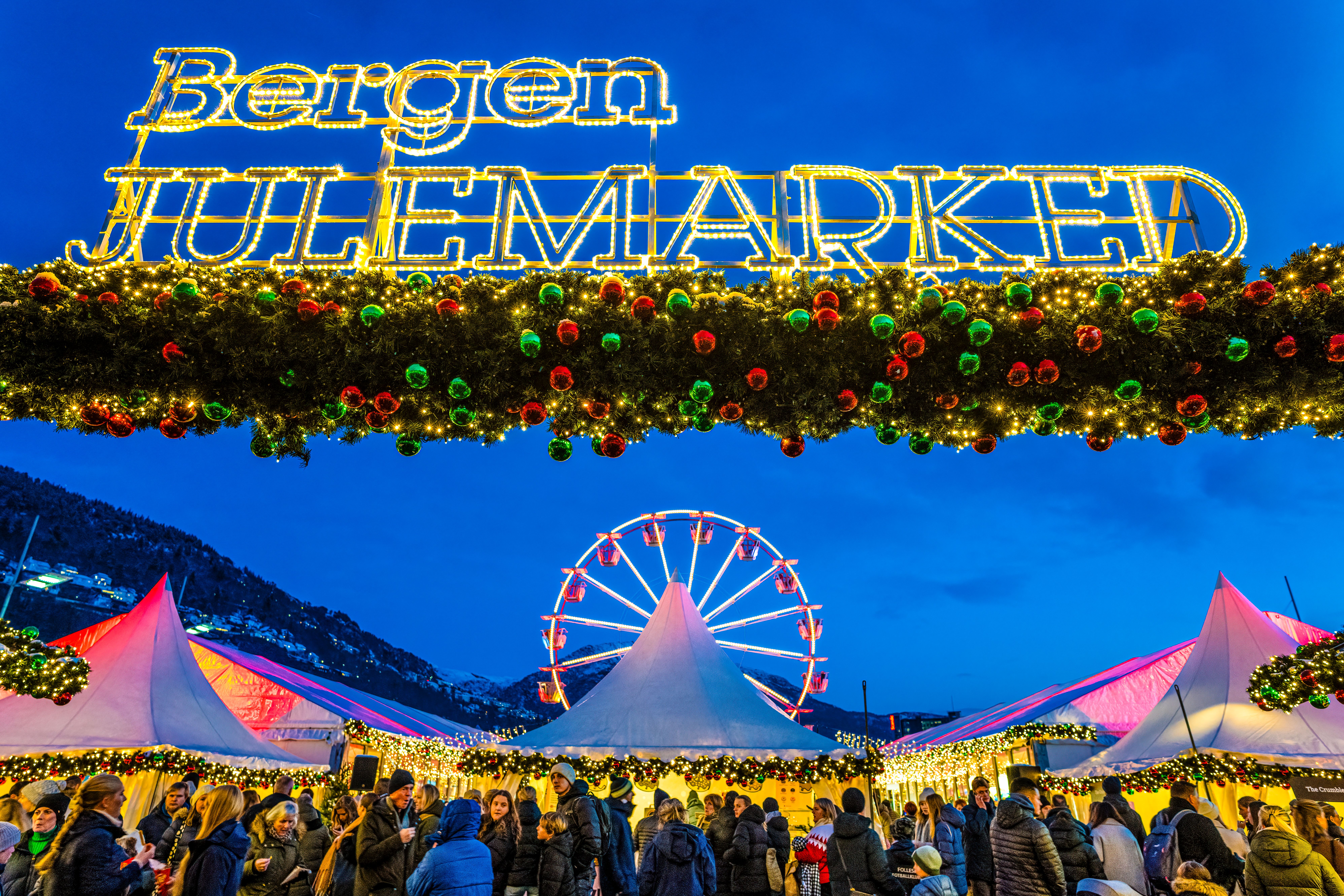 Christmas market with Ferris wheel in Bergen, Western Norway