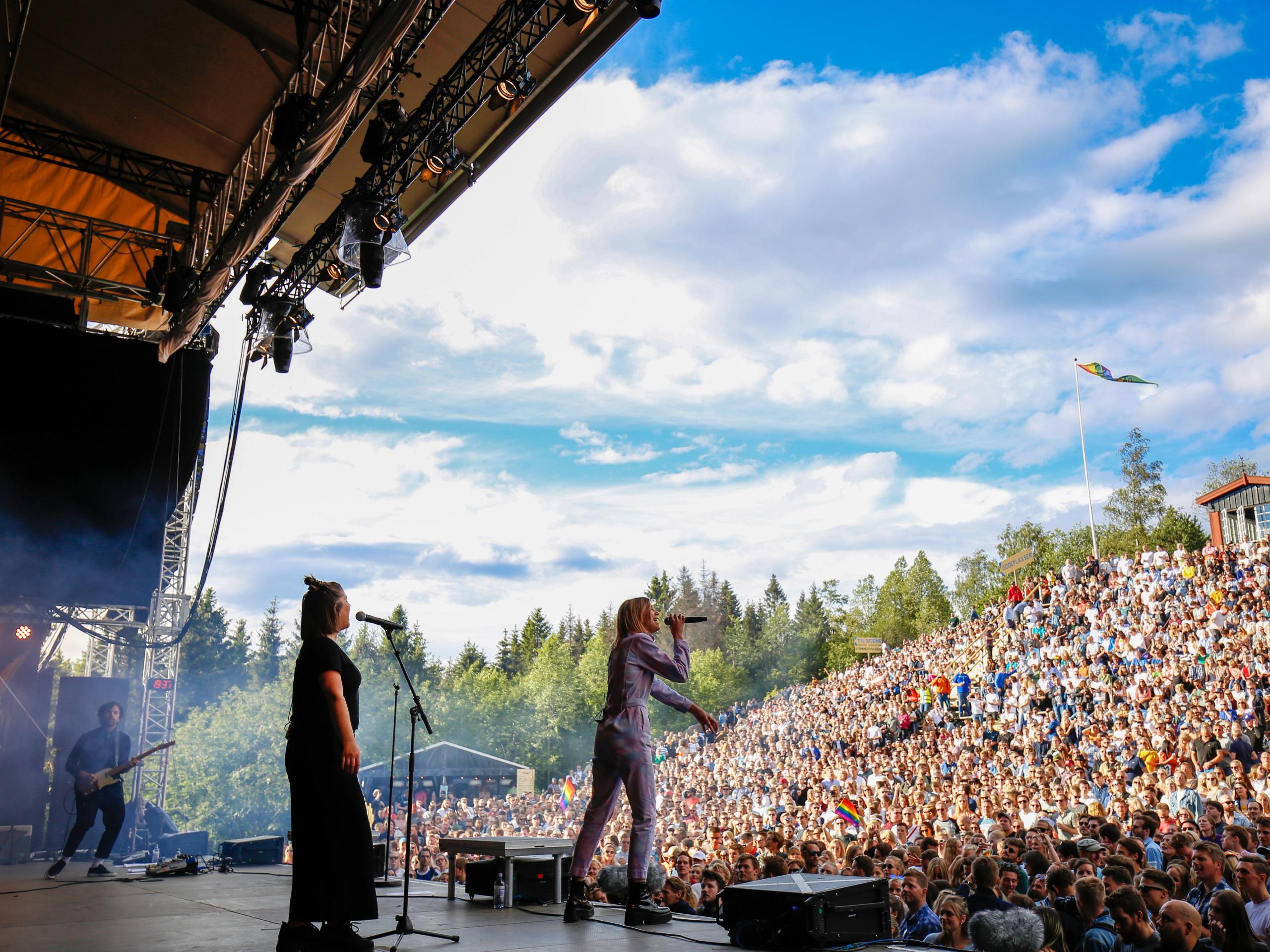 A musican performing in front of a large crowd at OsloOslo music festival at Grefsenkollen in Oslo, Eastern Norway
