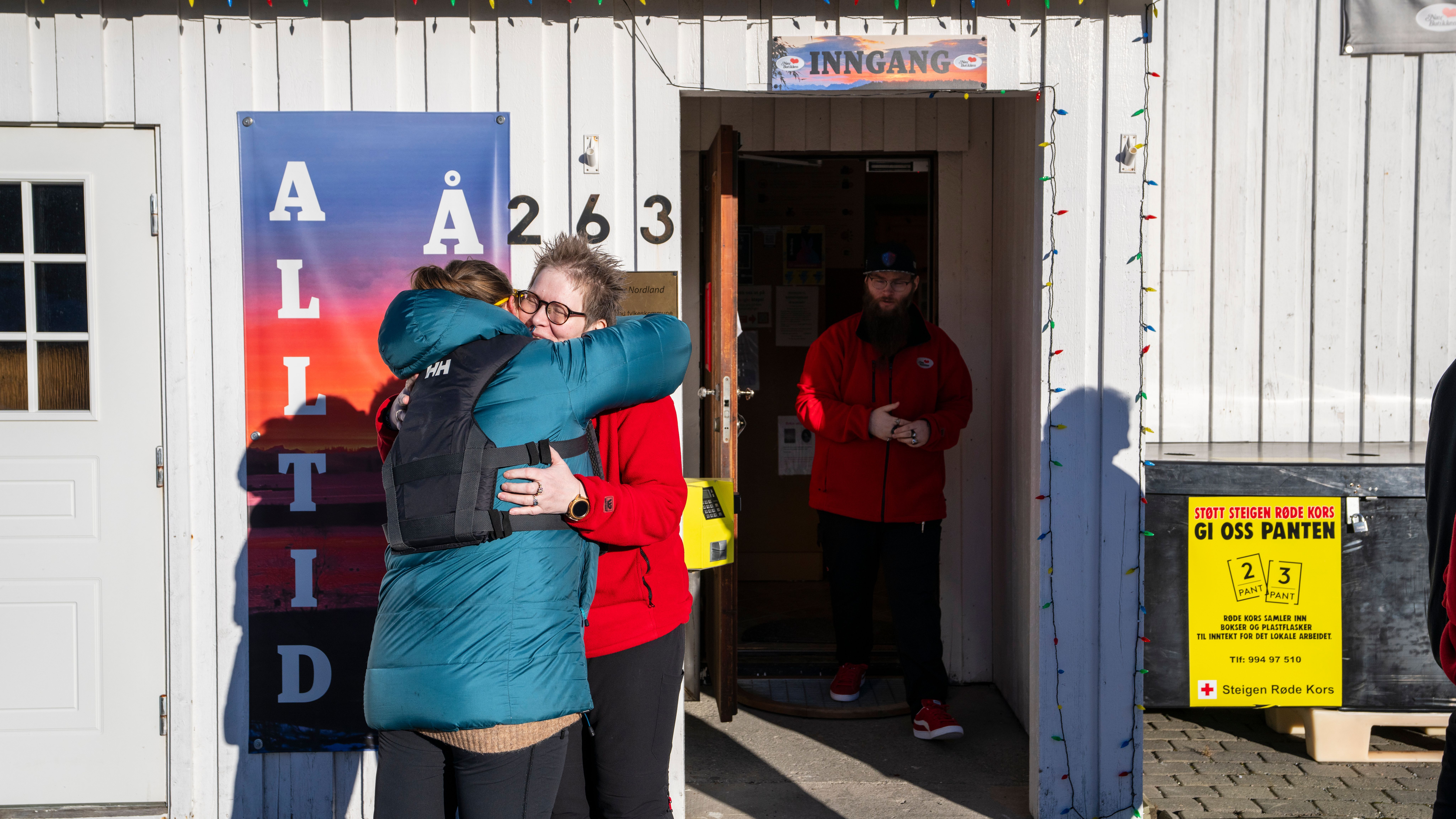 Two women hugging