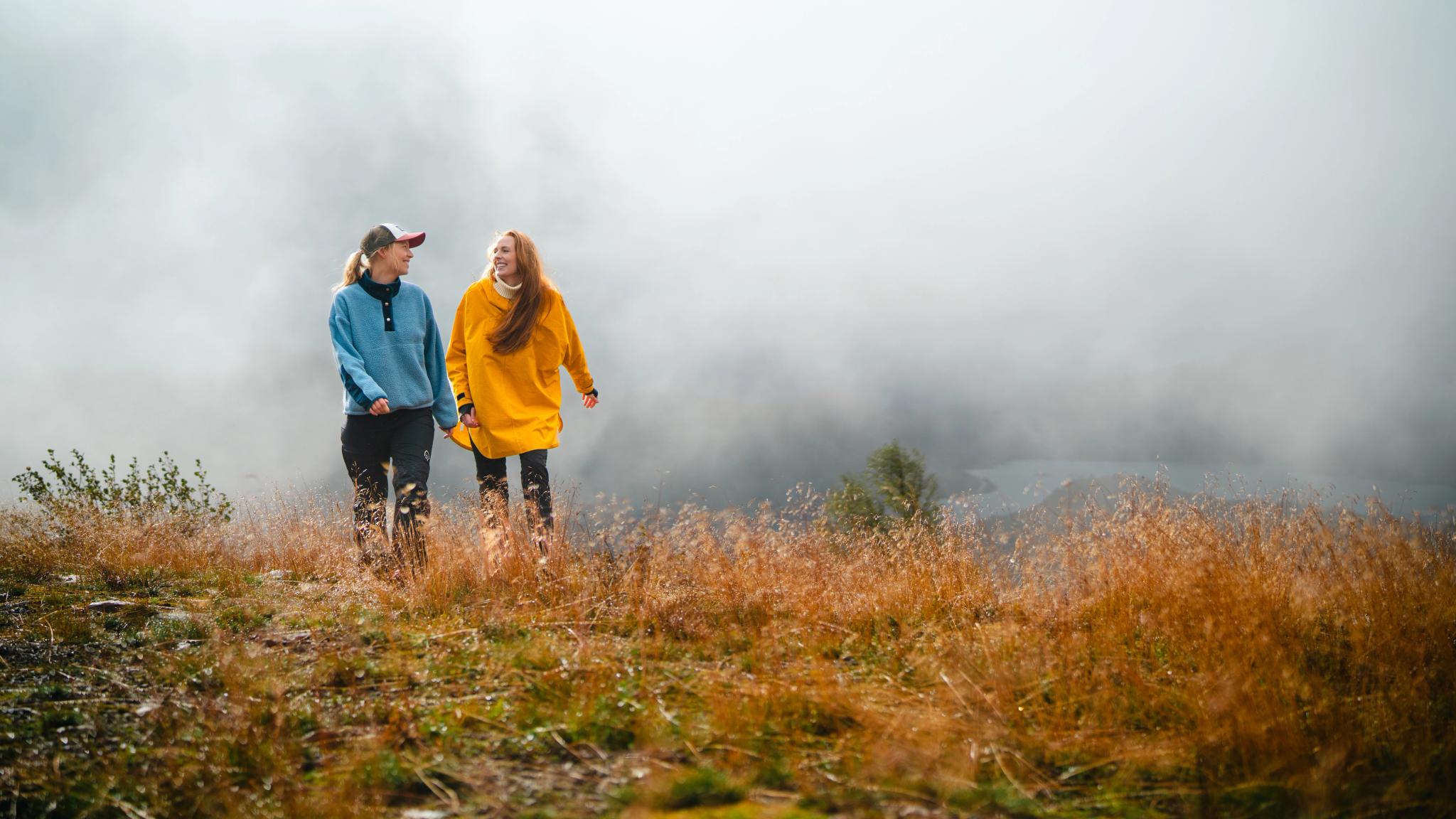 Two girls hiking in Hovden, Setesdal, Southern Norway