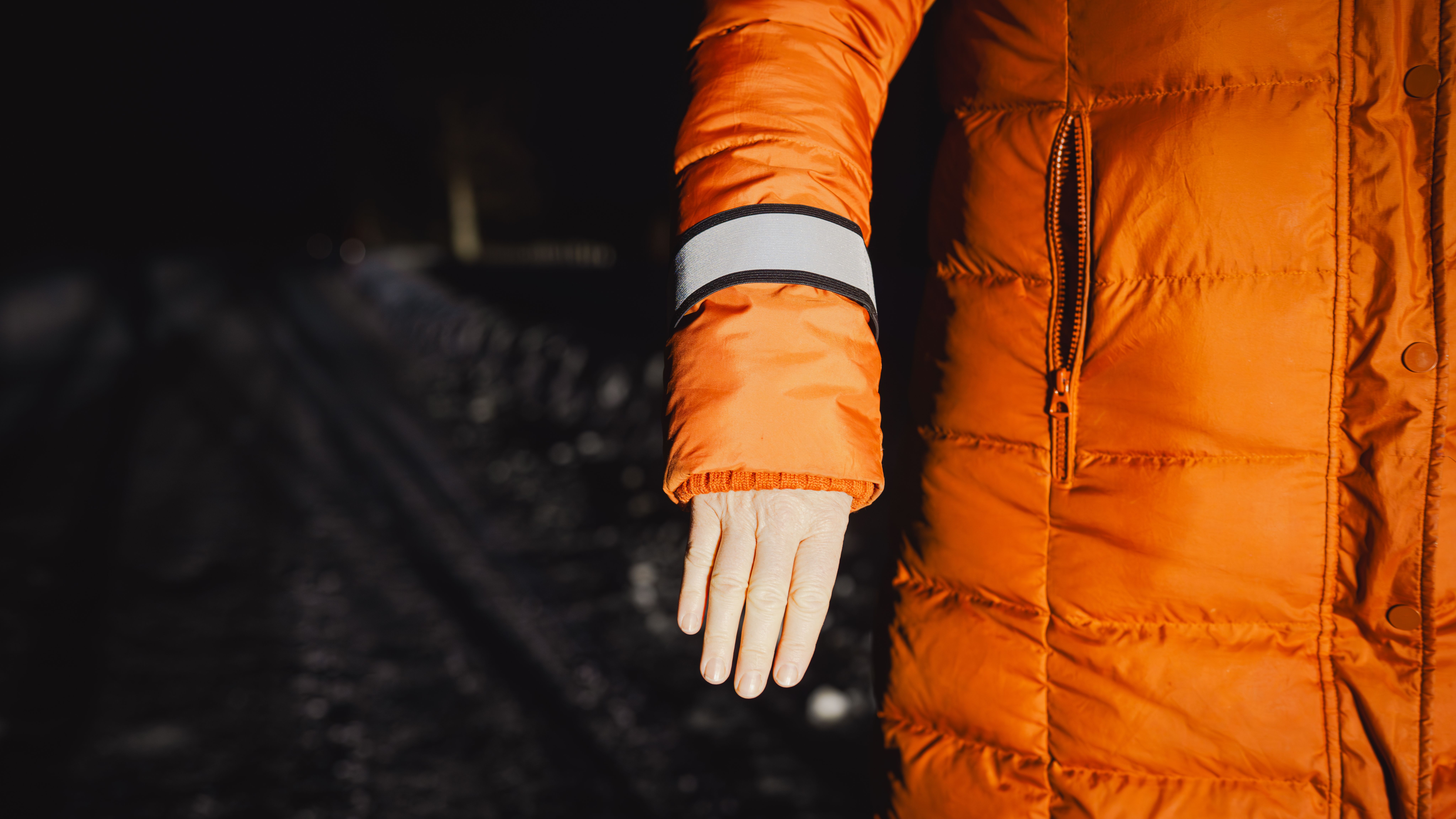 A hand with reflective gear.