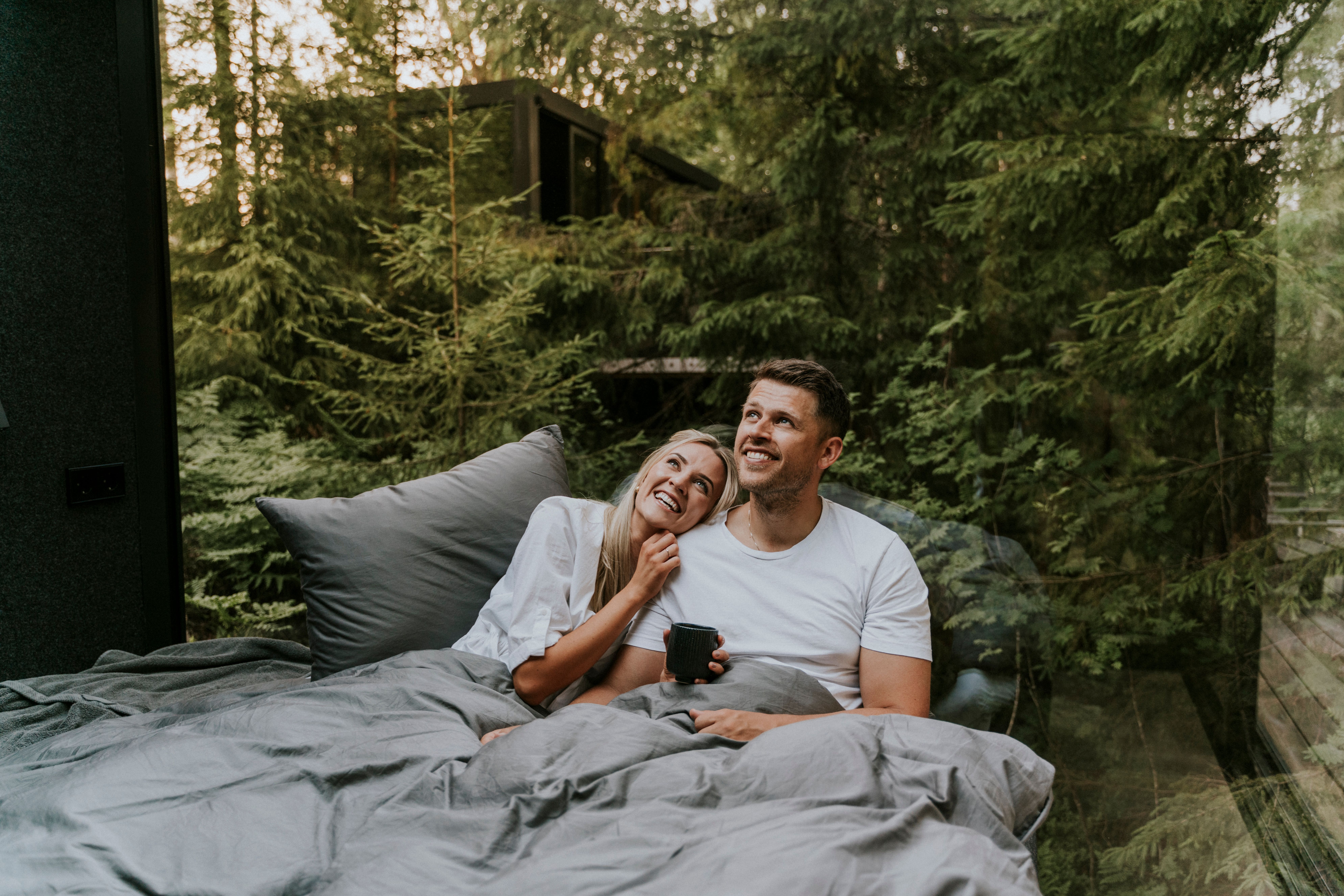 A man and a woman in bed at Laagen in Vestfold in Eastern Norway