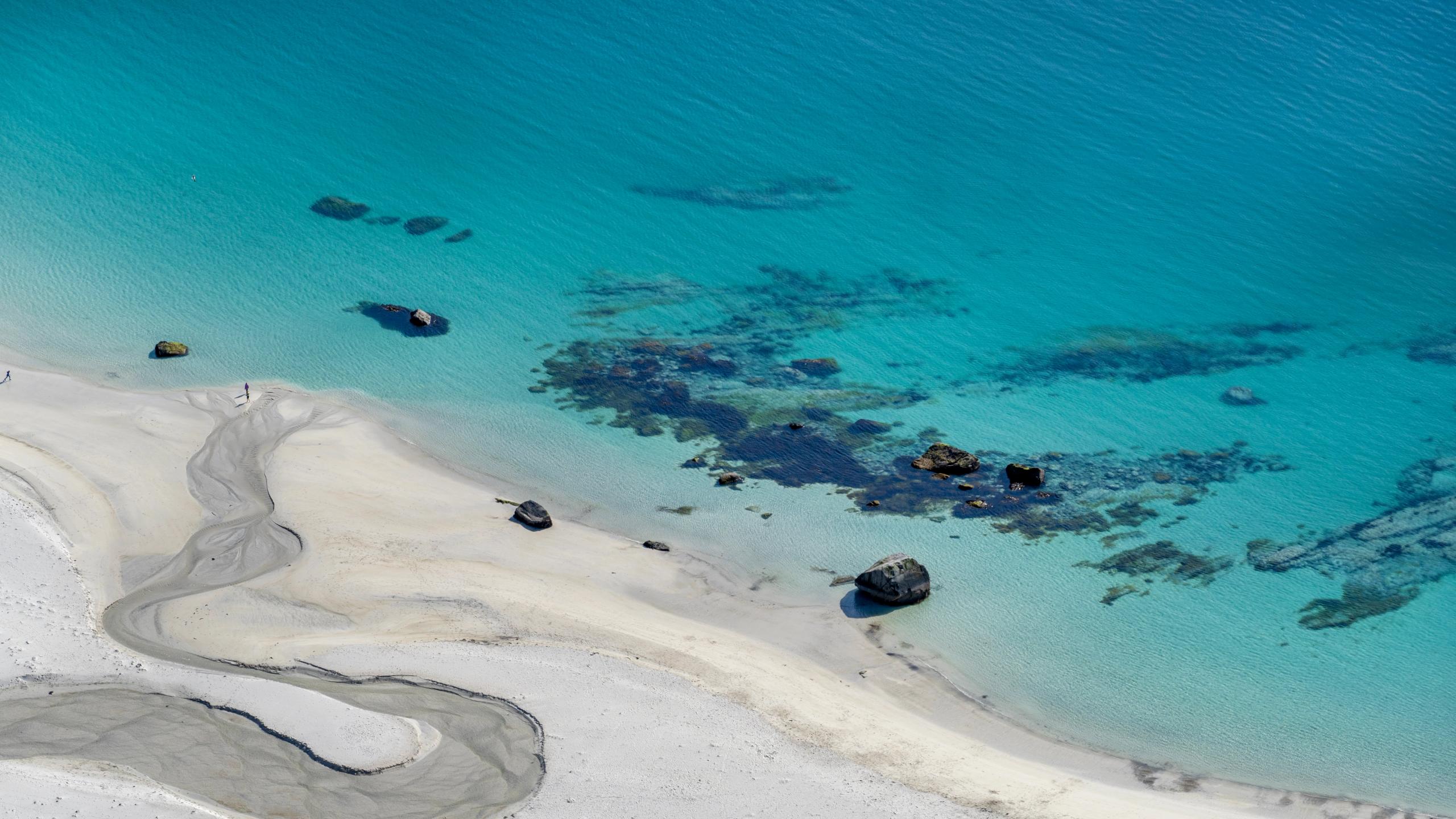 The turquoise water of the Hauklandstranda beach in Lofoten in Northern Norway