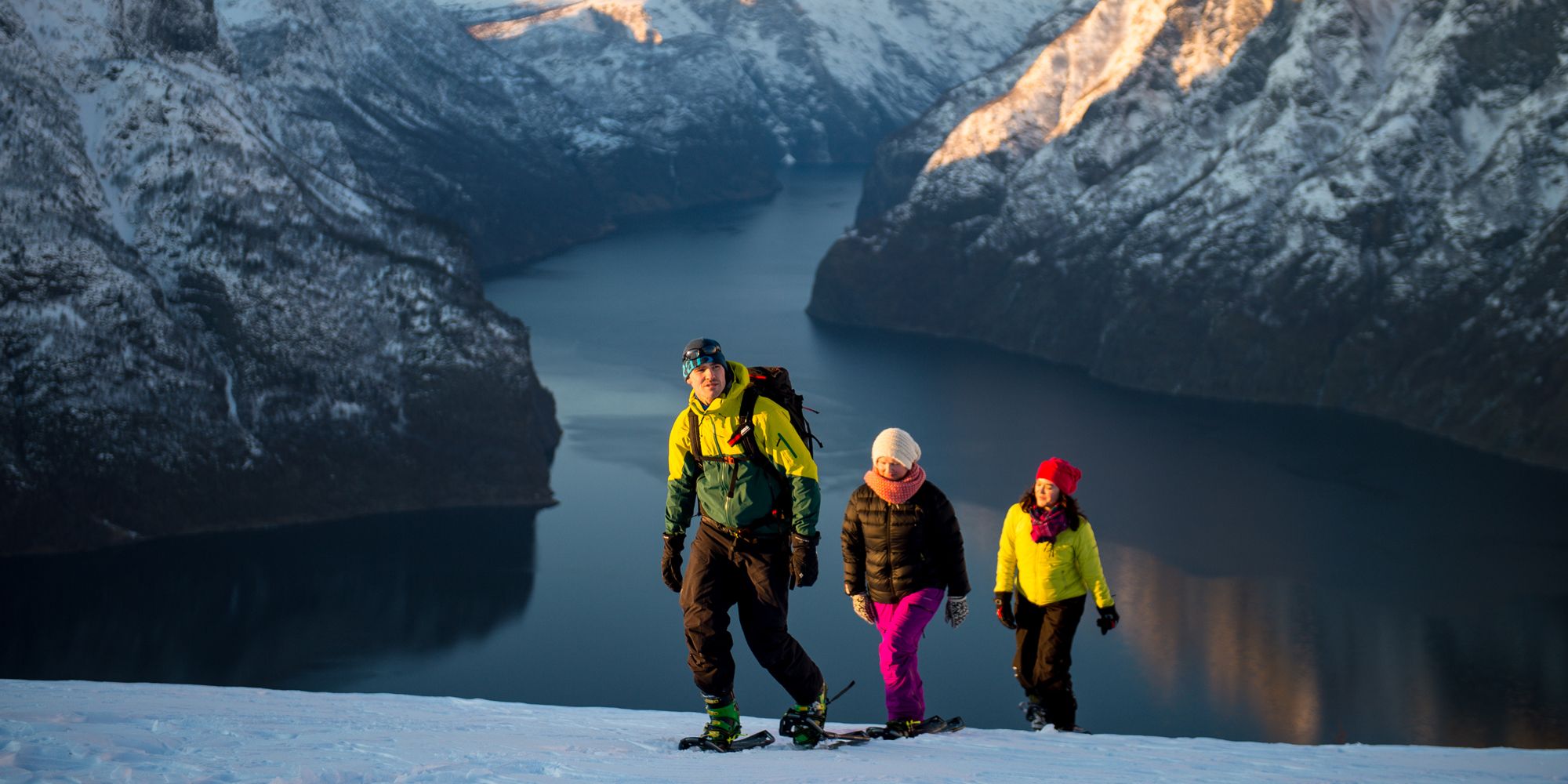A family of three snowshoeing at Aurlandsfjellet