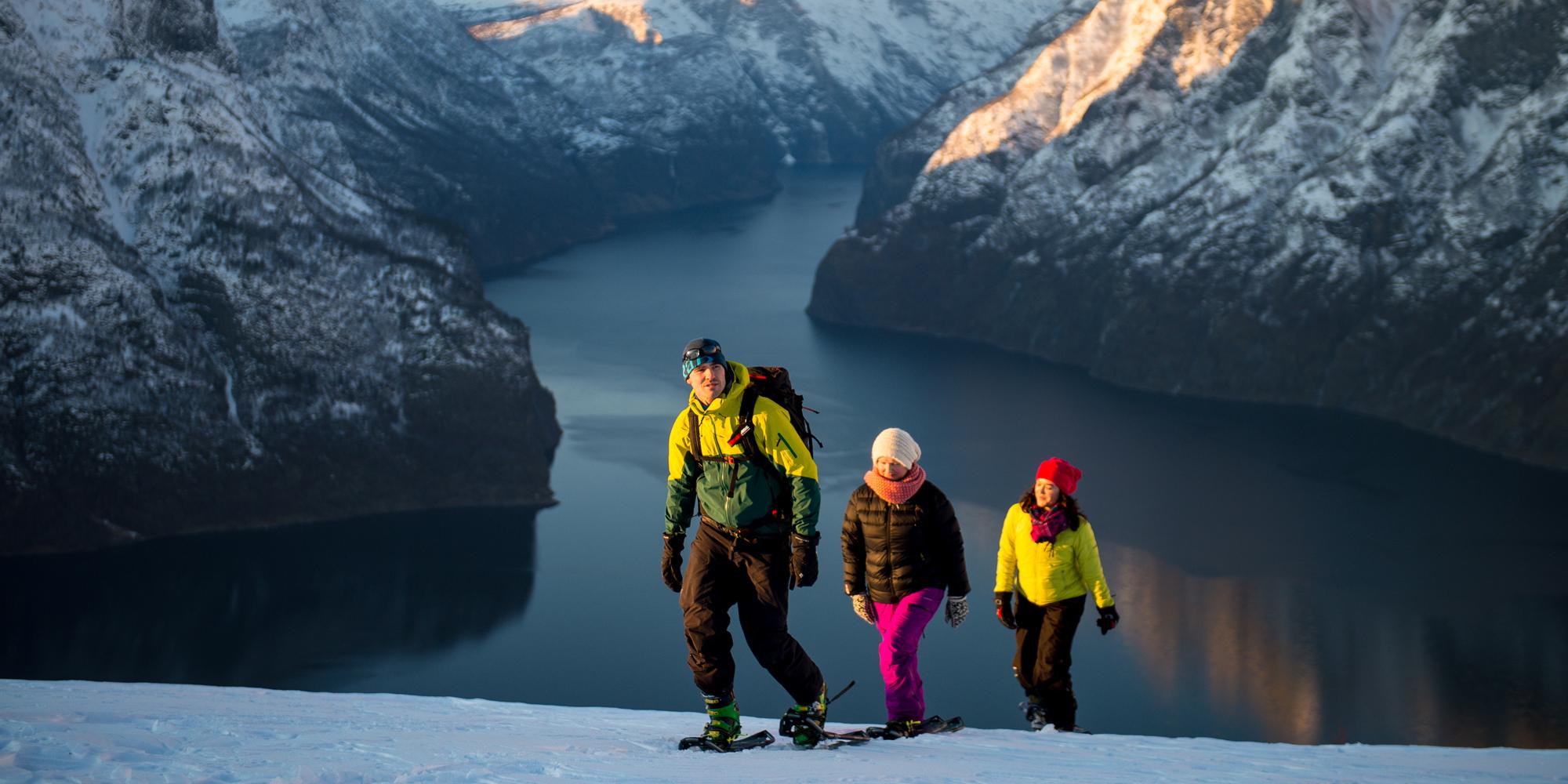 A family of three snowshoeing at Aurlandsfjellet