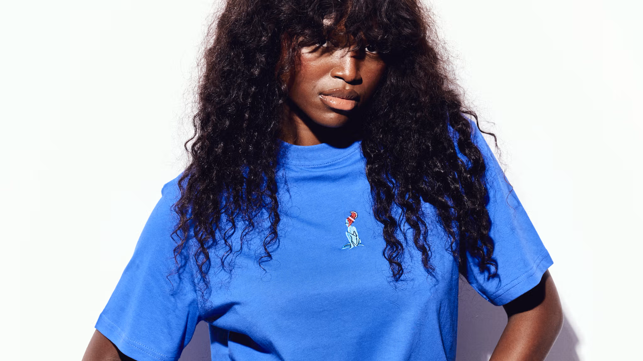 A model in blue Gombi clothing