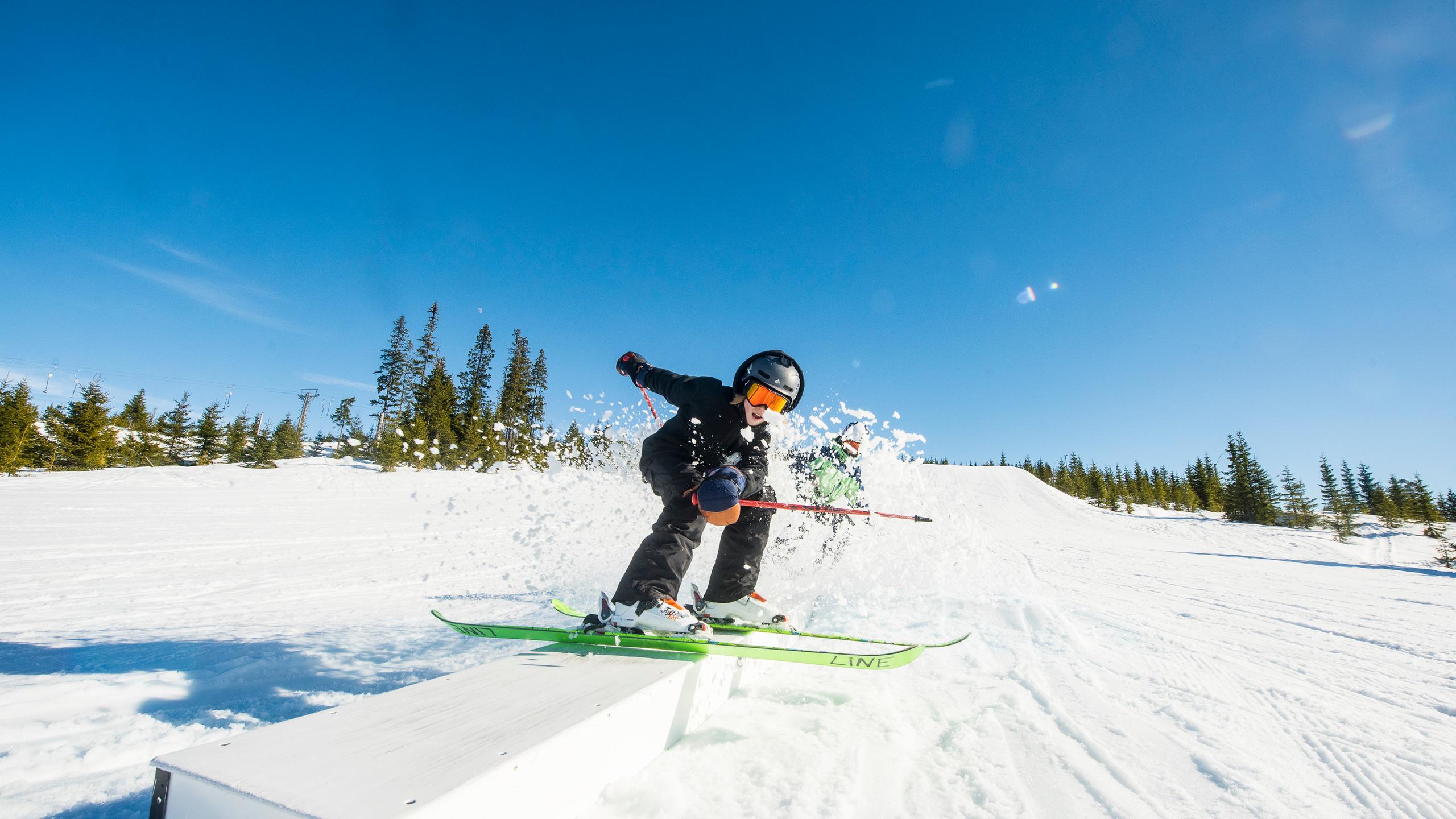 Child alpine skiing in terrain park, Hafjell Alpine Resort, Eastern Norway