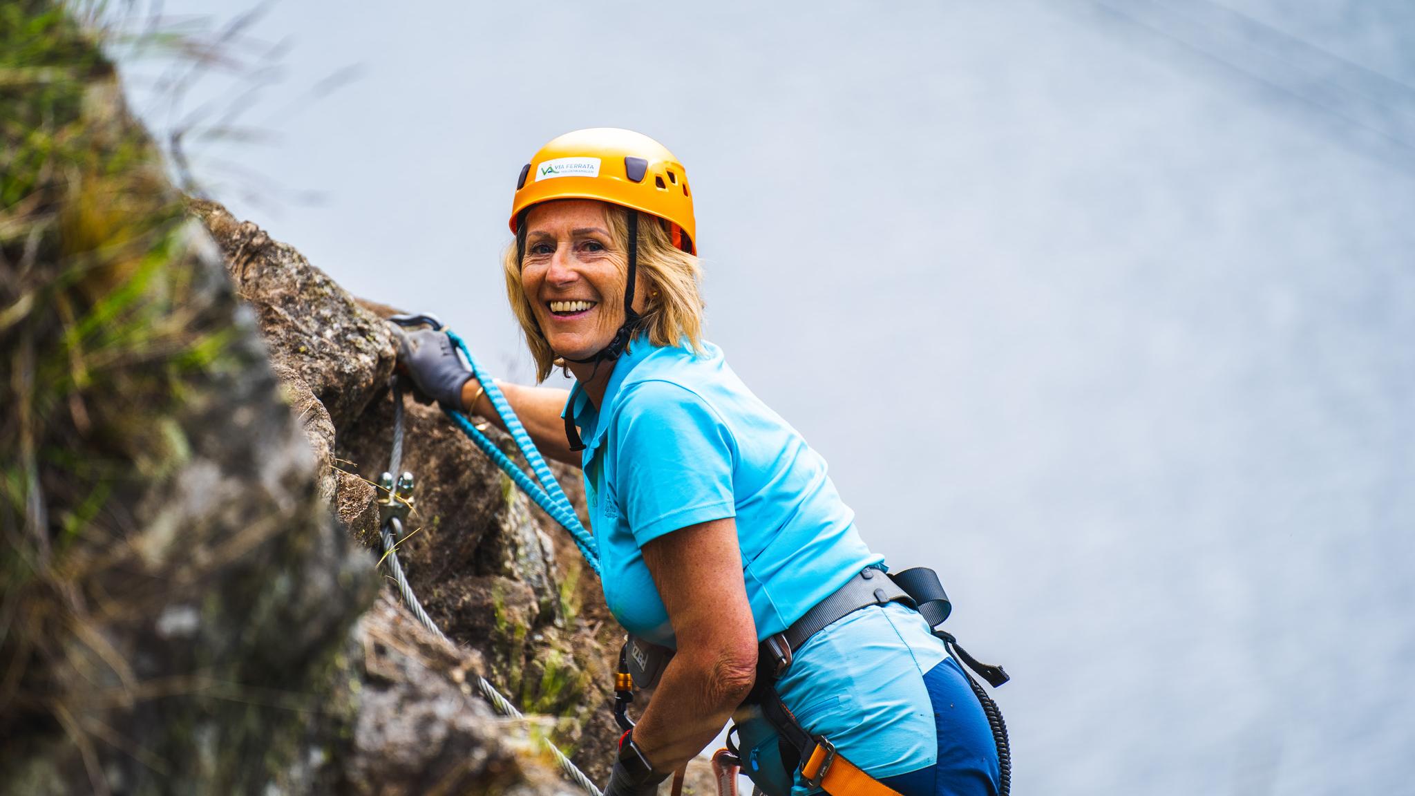 Woman climbing the Via Ferrata in Haldenkanalen