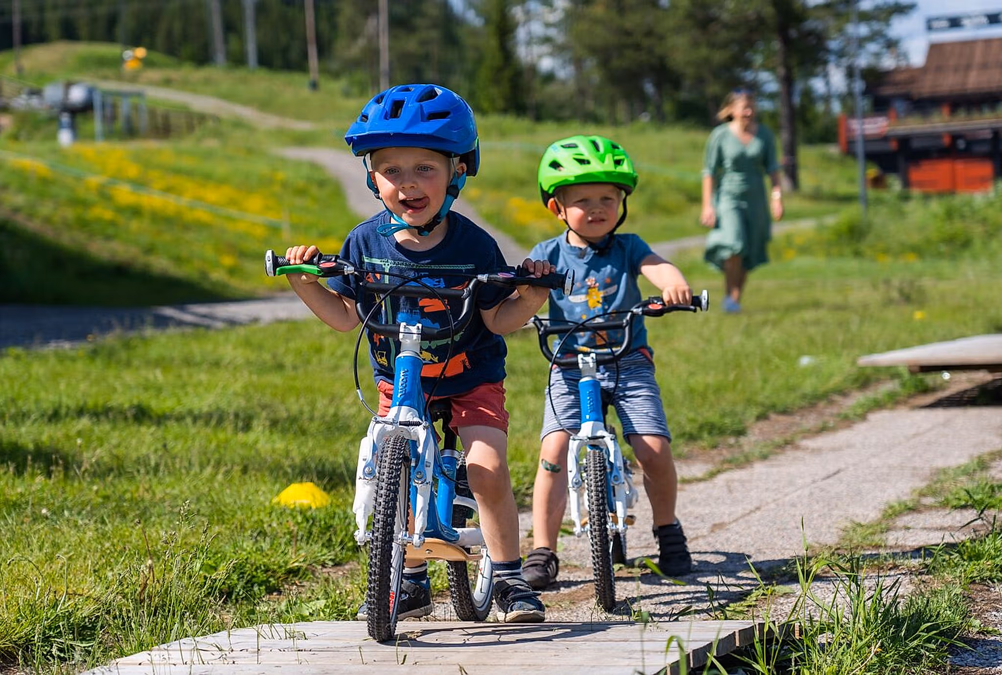 children ride bicycles in Trysil, Norway
