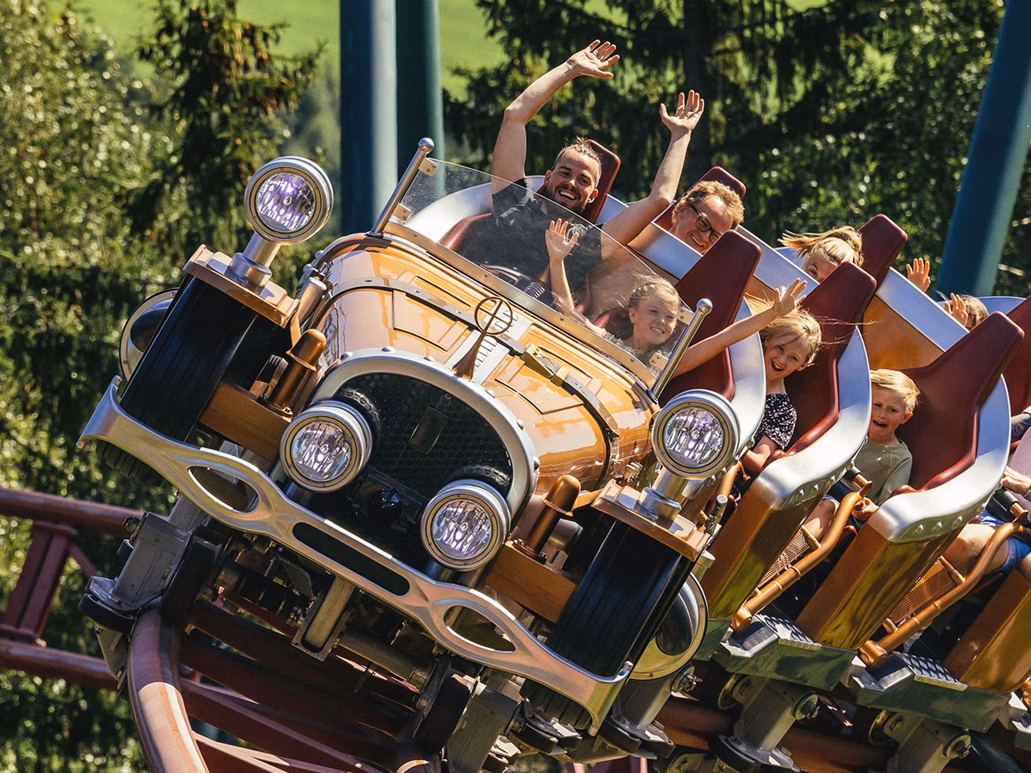 Families riding a rollercoaster in Hunderfossen.
