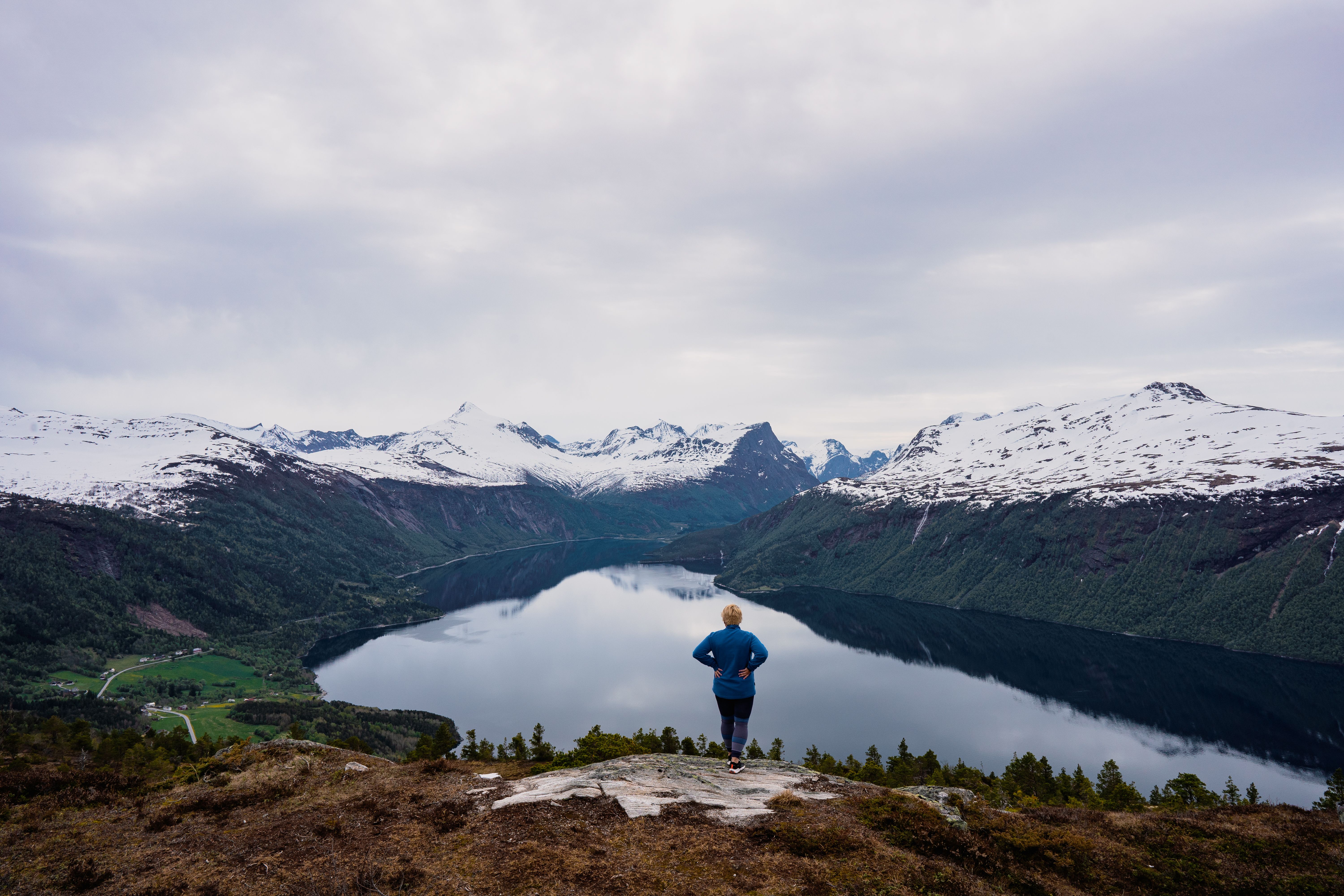 A person standing on top of mount Prestaksla 