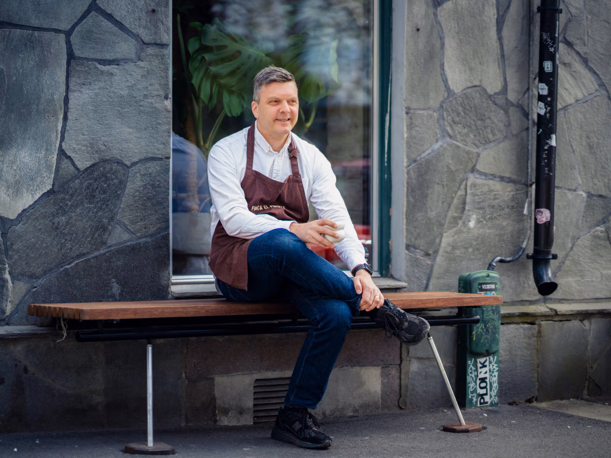 Portrait of Tim Wendelboe in front of his cafe