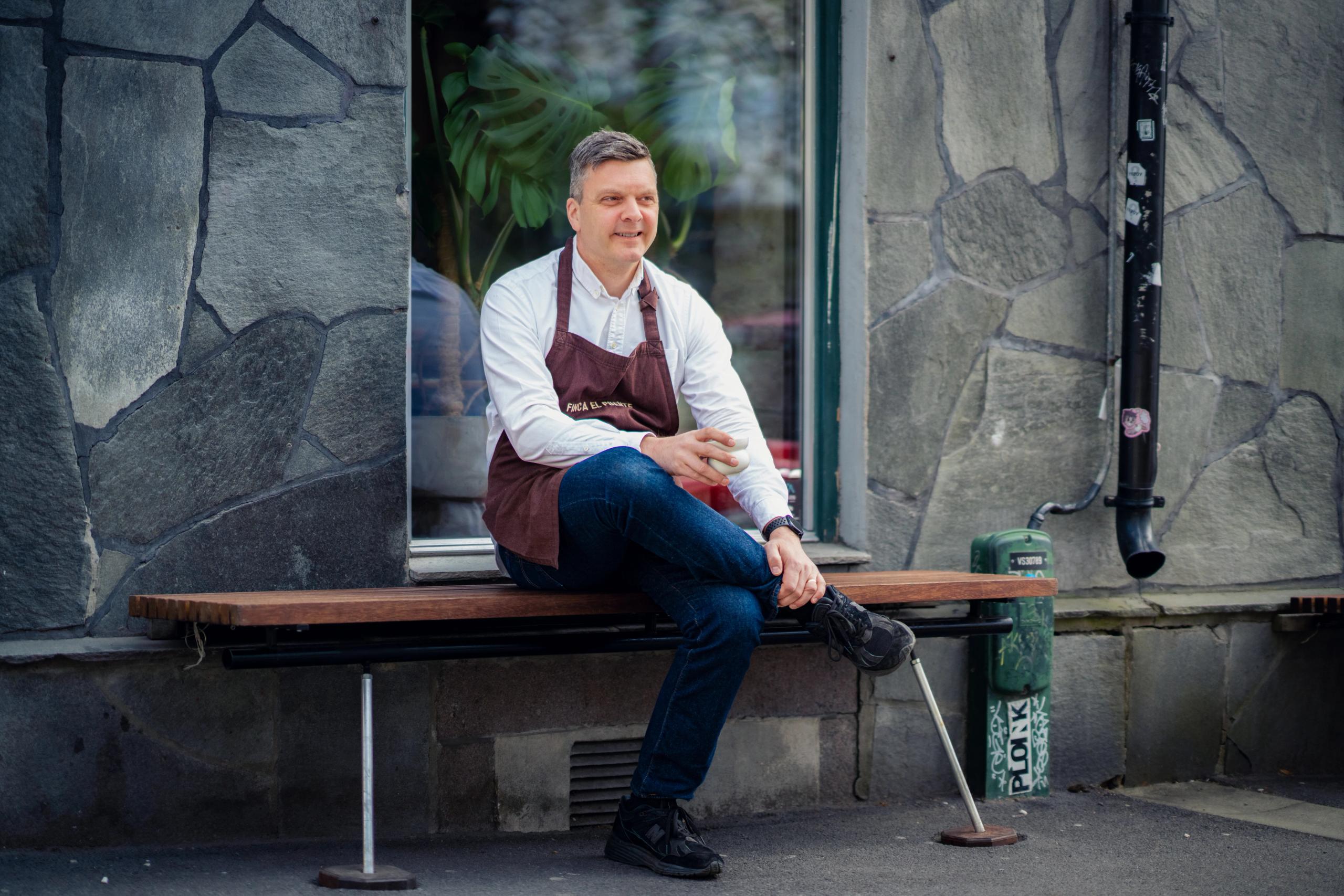 Portrait of Tim Wendelboe in front of his cafe