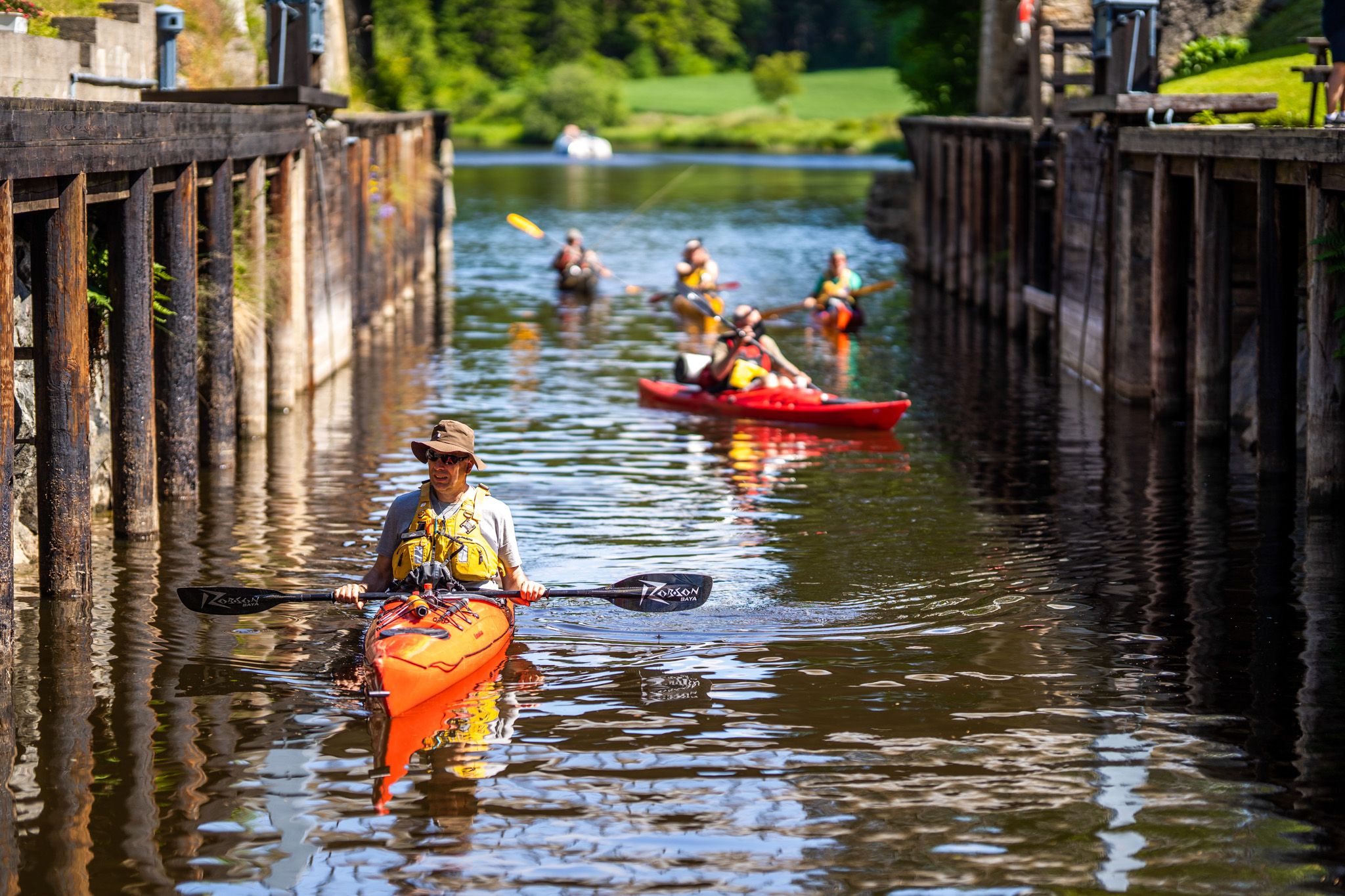 Kayaking in Strømsfoss locks in the Halden Canal, Eastern Norway.